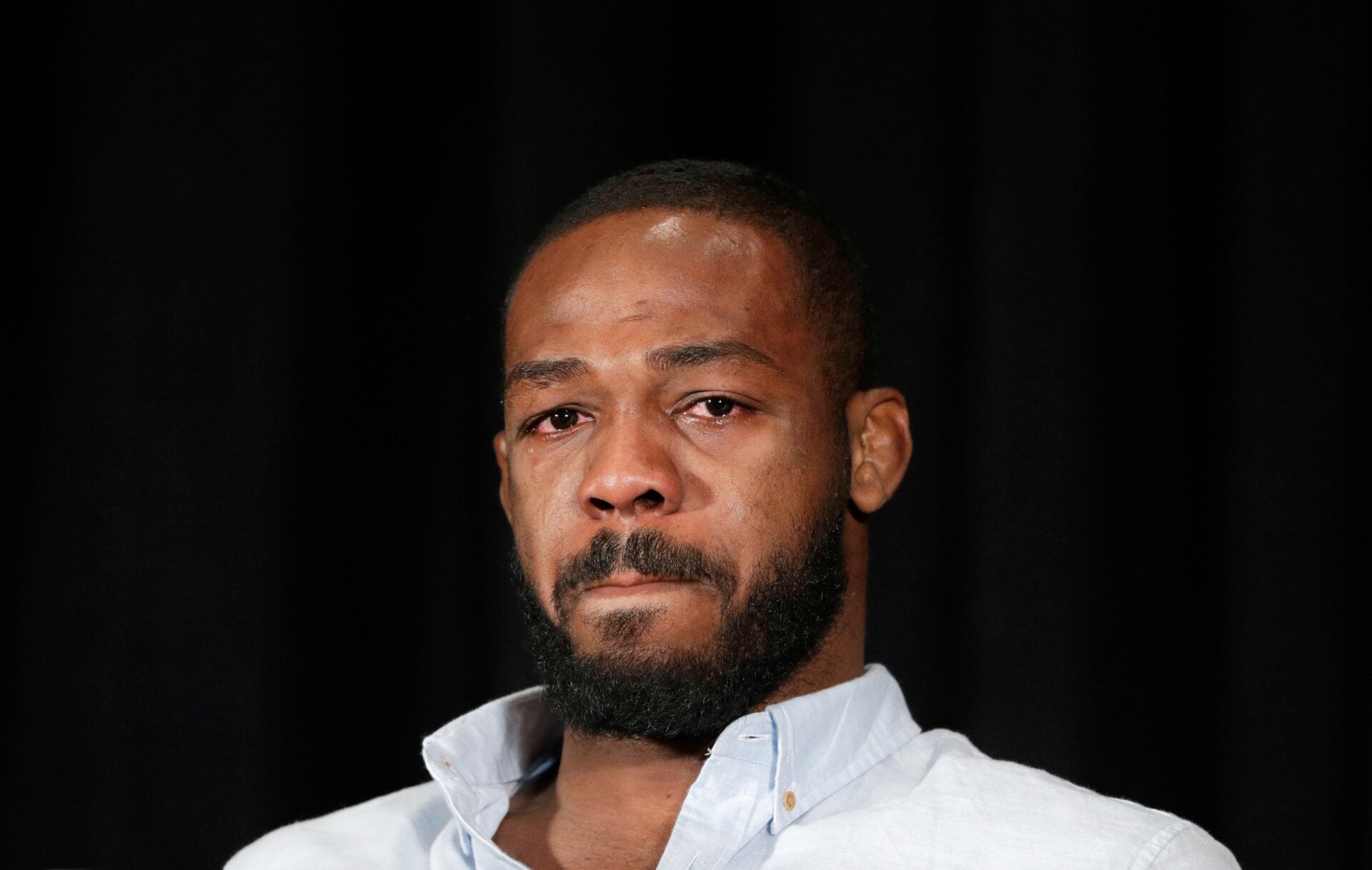 Jon Jones cries as he speaks during a news conference on July 7, 2016. (Credit: Associated Press)