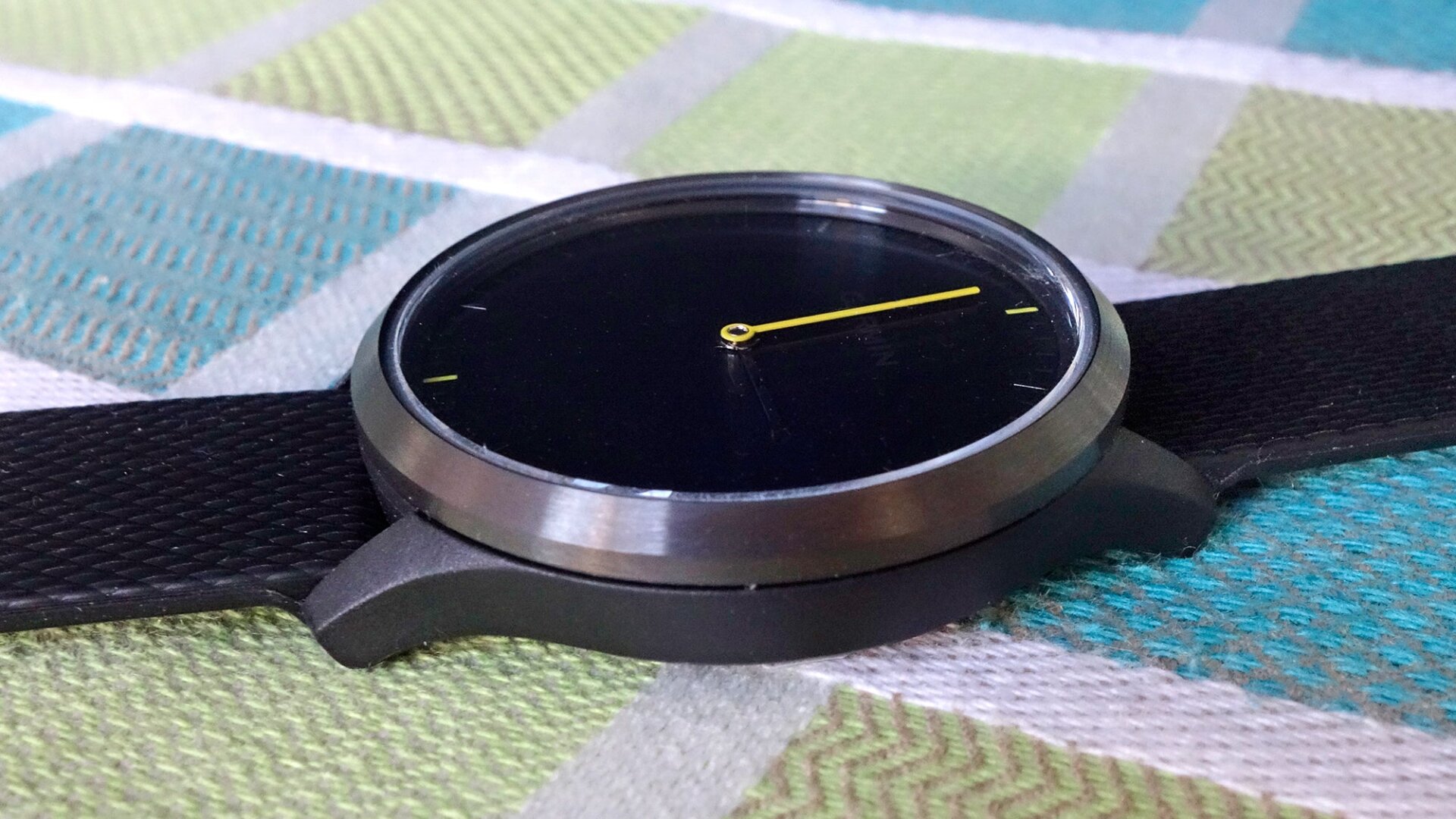 With its tiny LCD screen off, the Vívomove HR looks like a plain old watch.