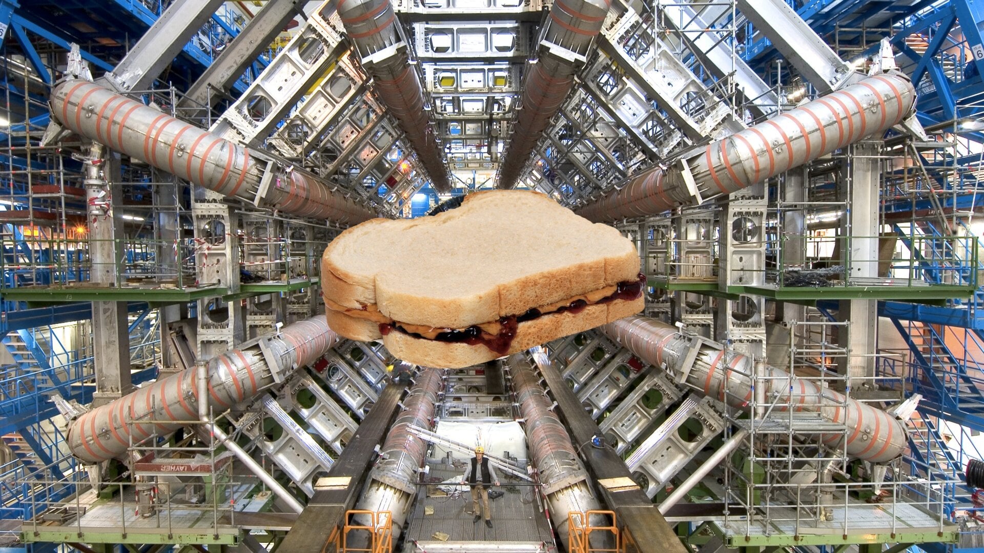 A sandwich edited onto an image of the LHC from 2008.