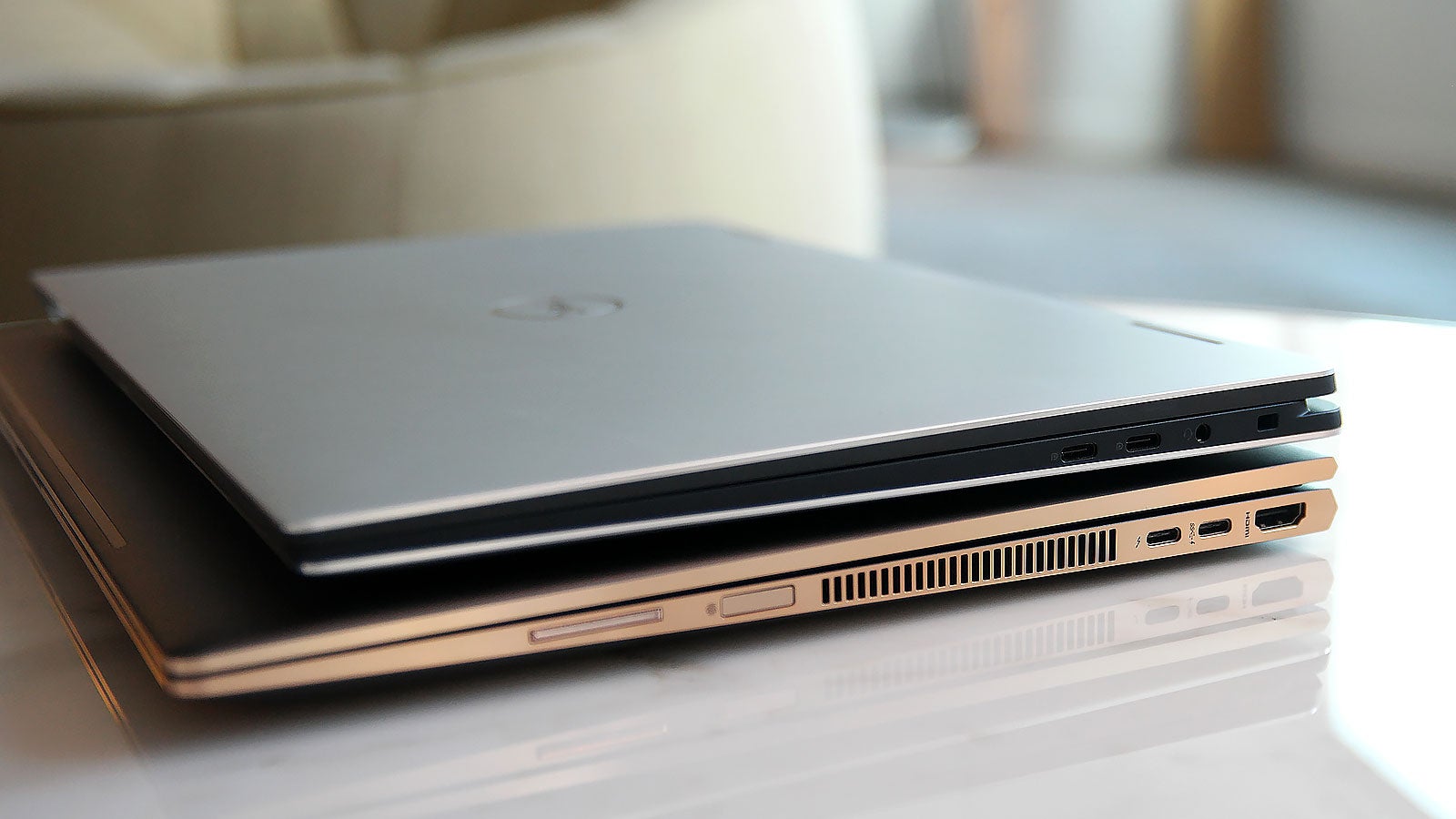 That little rectangle on the Spectre x360 is its built-in fingerprint sensor, which comes standard as part of the system. Dell’s fingerprint reader is built into the power button, but it’s an optional extra. 