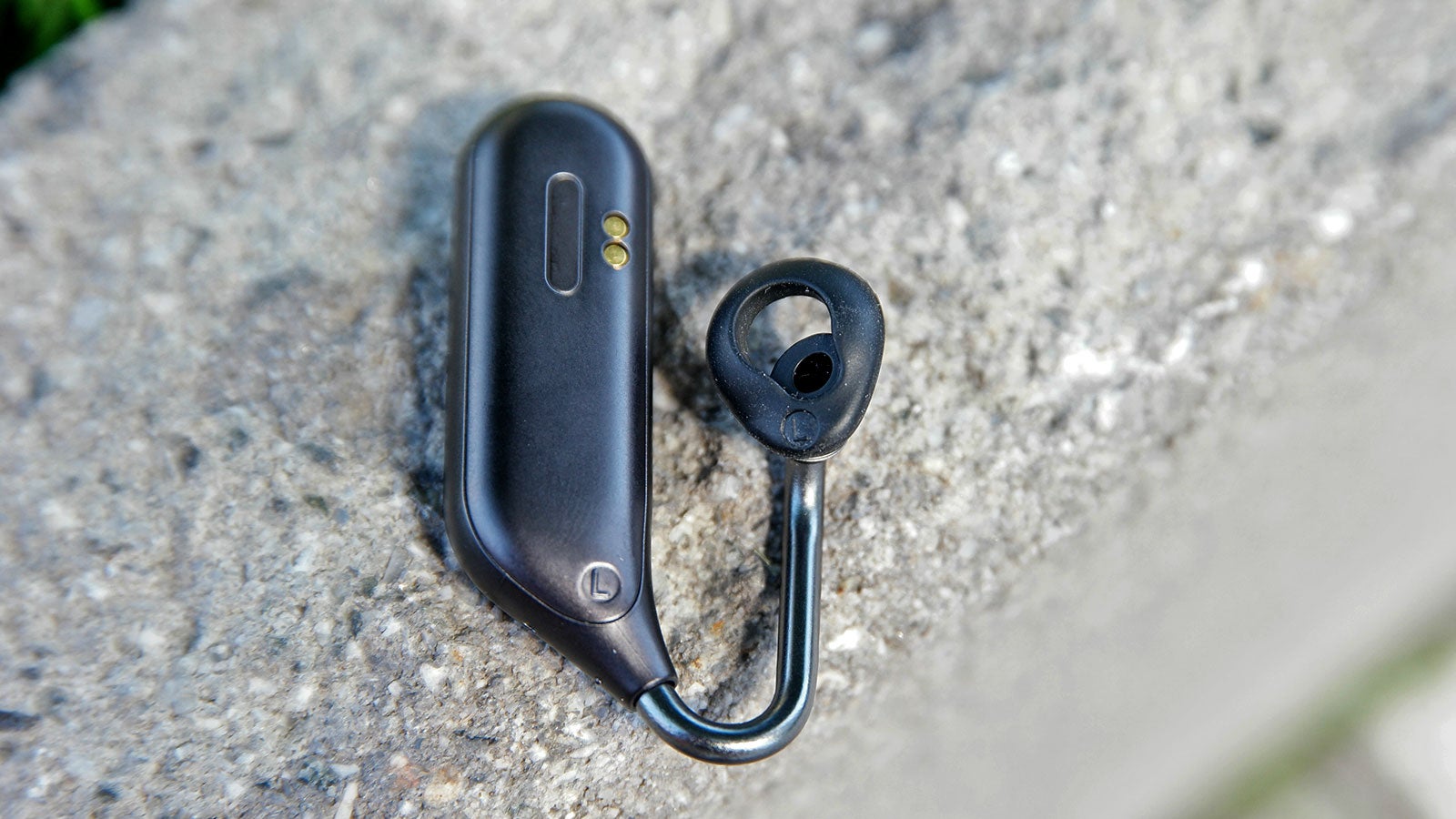 The Ear Duo’s drivers are in the pod, which sends music down the tube and into your ears, while the opening in the ear pads let in unobstructed ambient sound. 