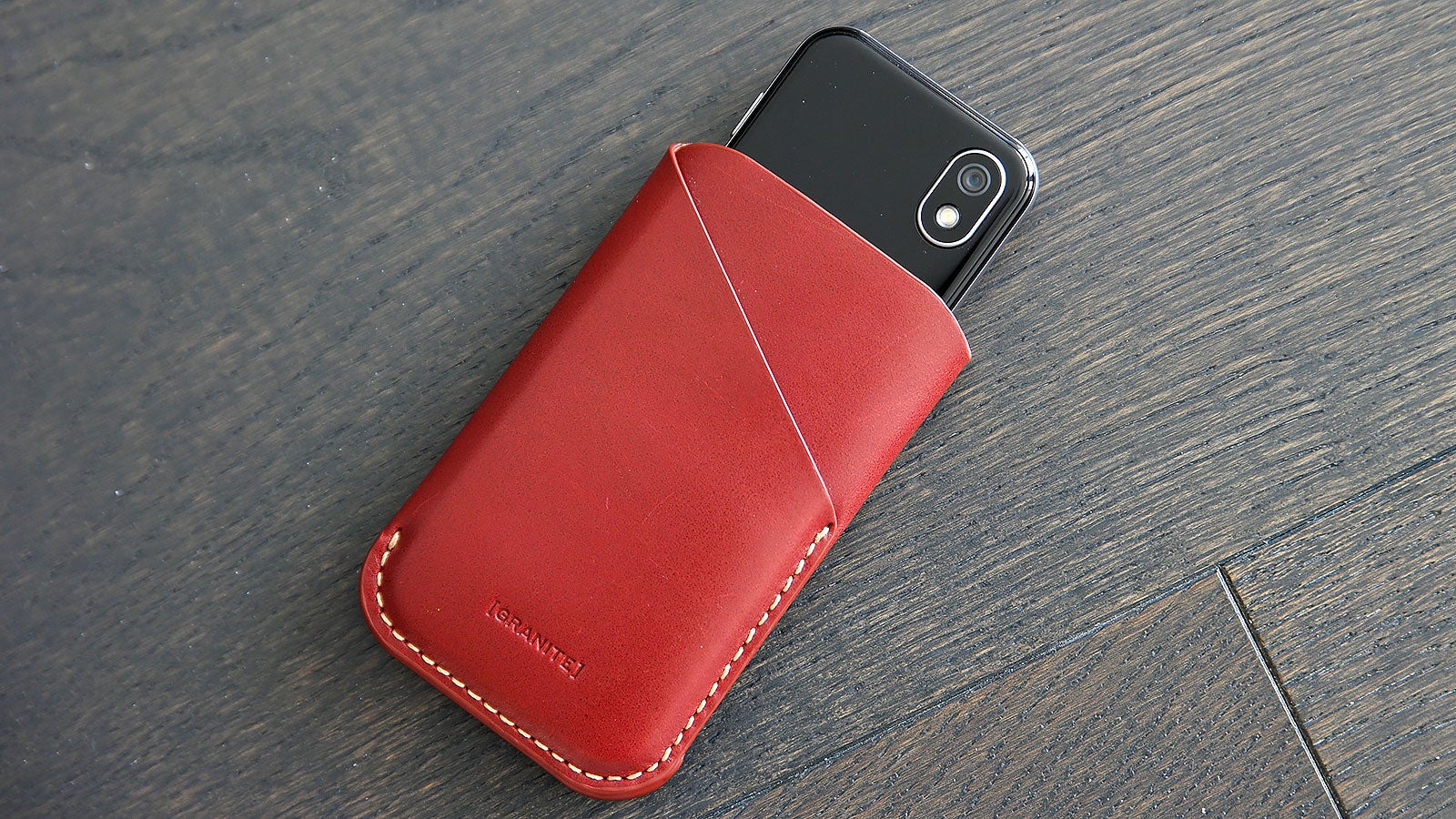 Even with a protective leather case, you can fit the Palm’s baby phone almost anywhere.