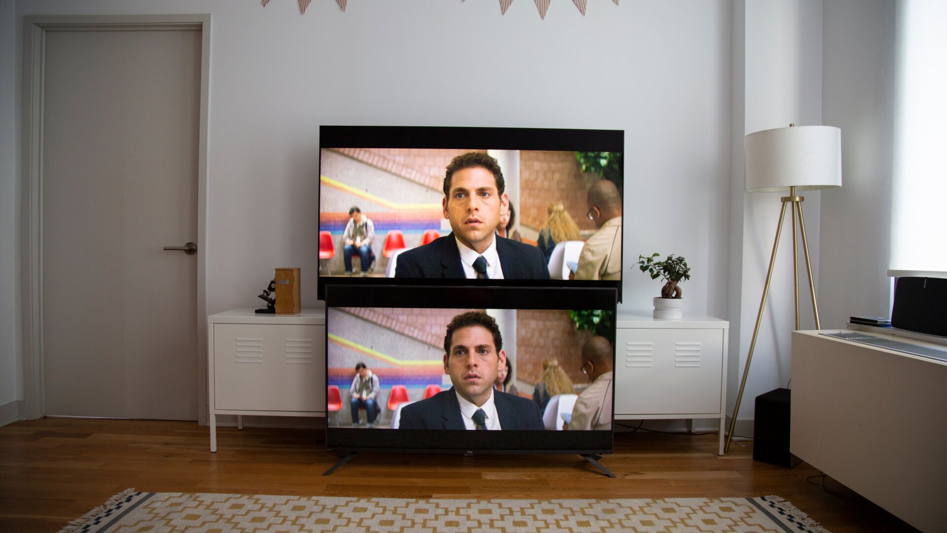 The $2,200 Vizio P-Series Quantum (top) vs. a ($650) 55-inch TCL 6-Series. A 65-inch TCL 6-Series costs $1,000.