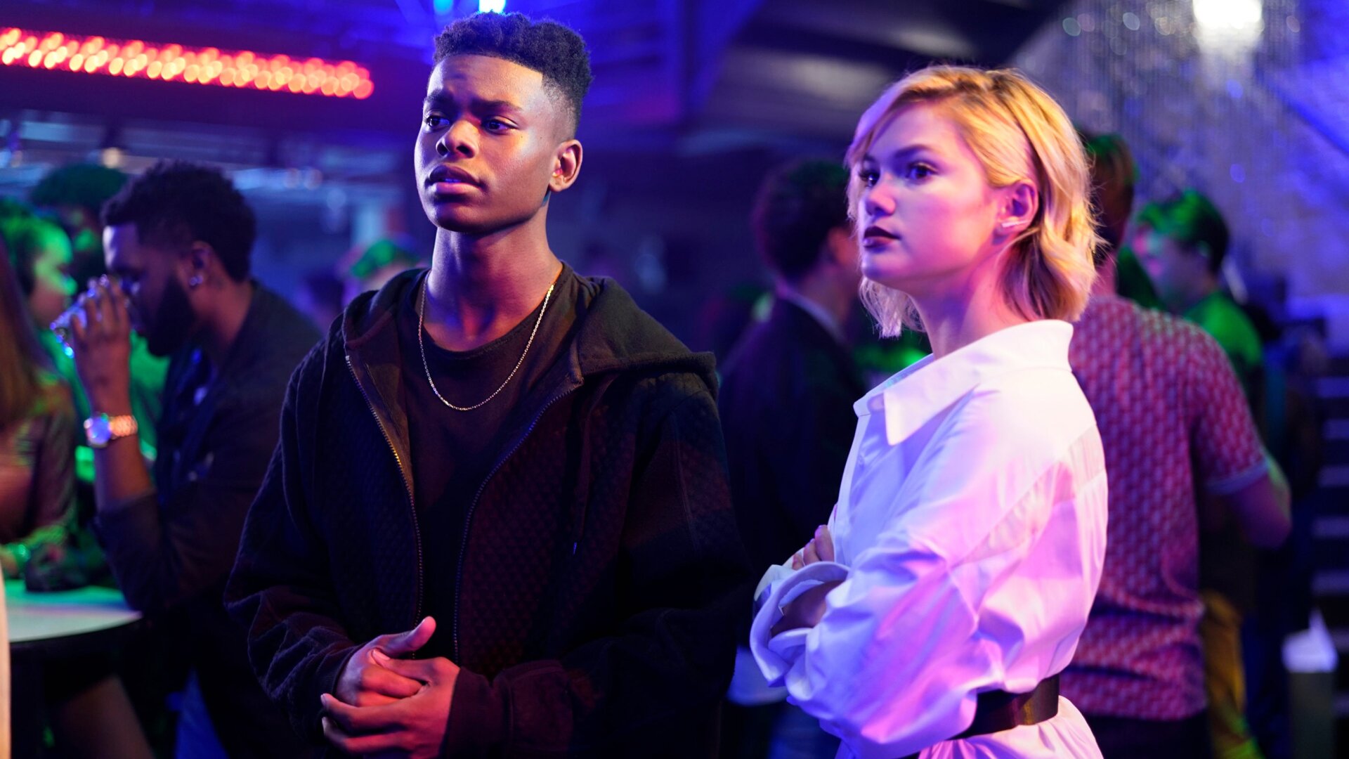 Cloak and Dagger posing as partygoers and staking out a meeting of crime lords.