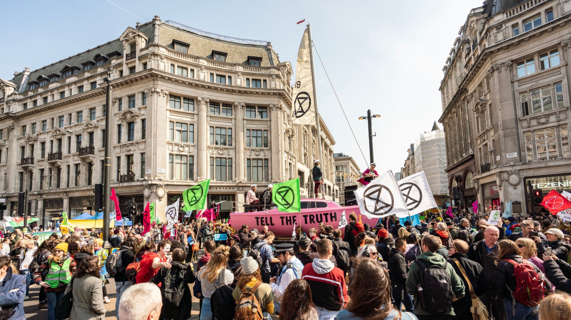 Protesters take over Oxford Circus, including installing a boat.