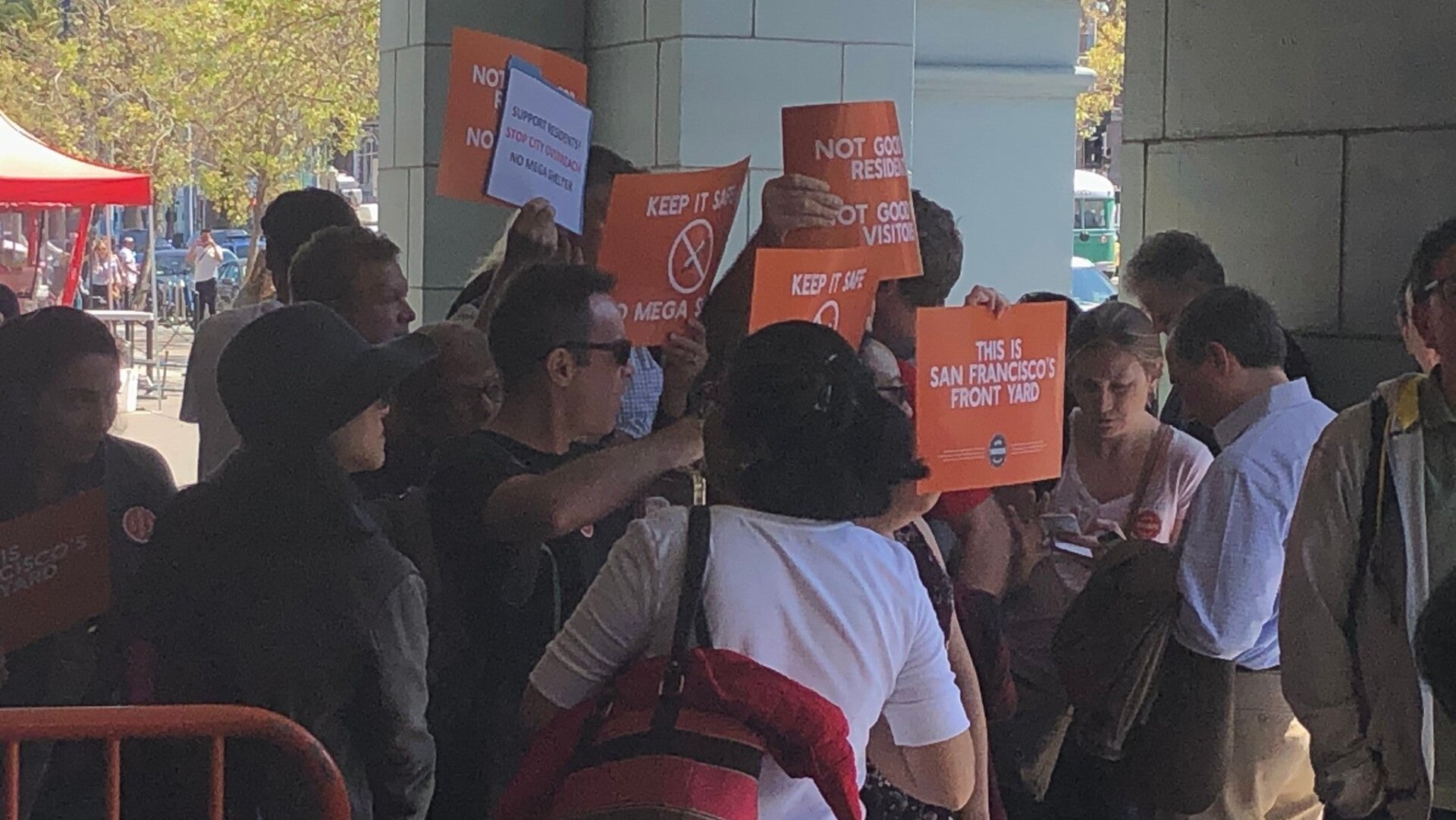 Opponents of the Embacardero homeless navigation center protest its construction in San Francisco.