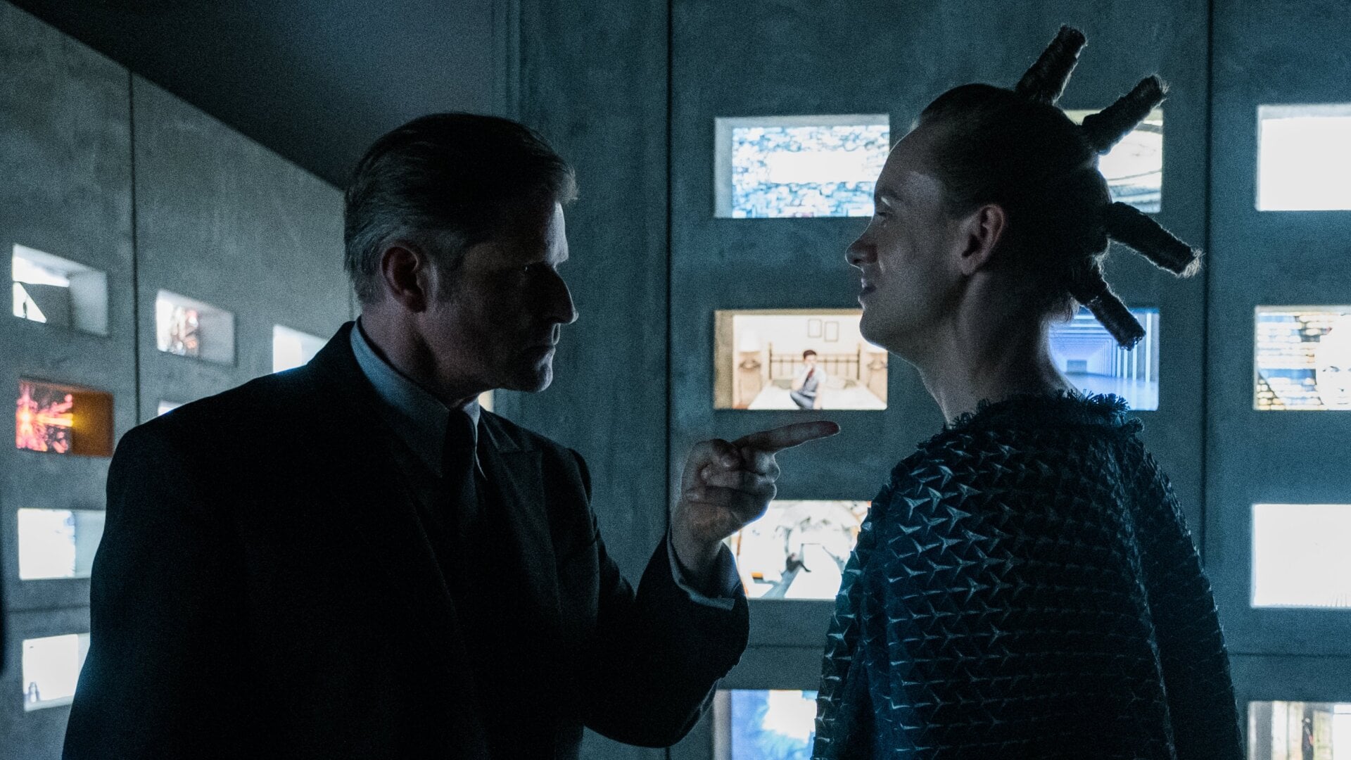 Crispin Glover as Mr. World and Bruce Langley as the Technical Boy.