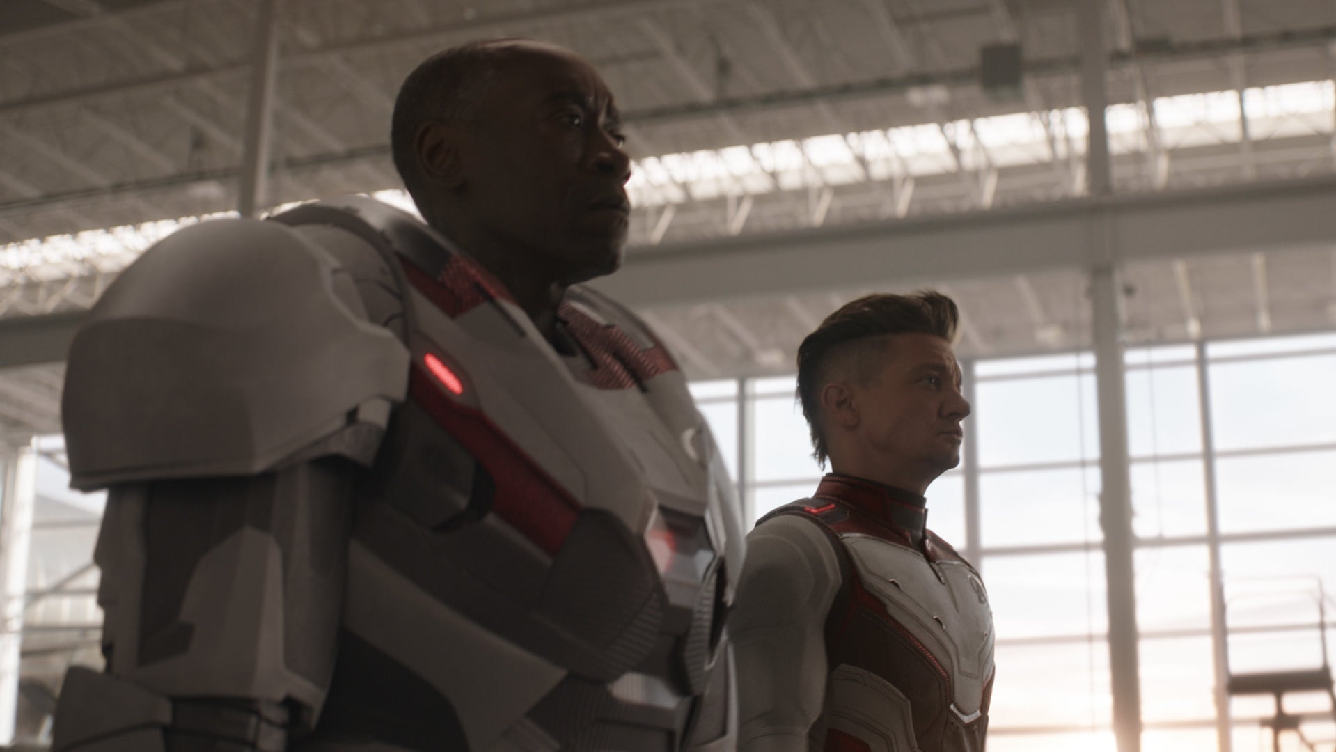Hawkeye (Jeremy Renner) and War Machine (Don Cheadle) suit up.