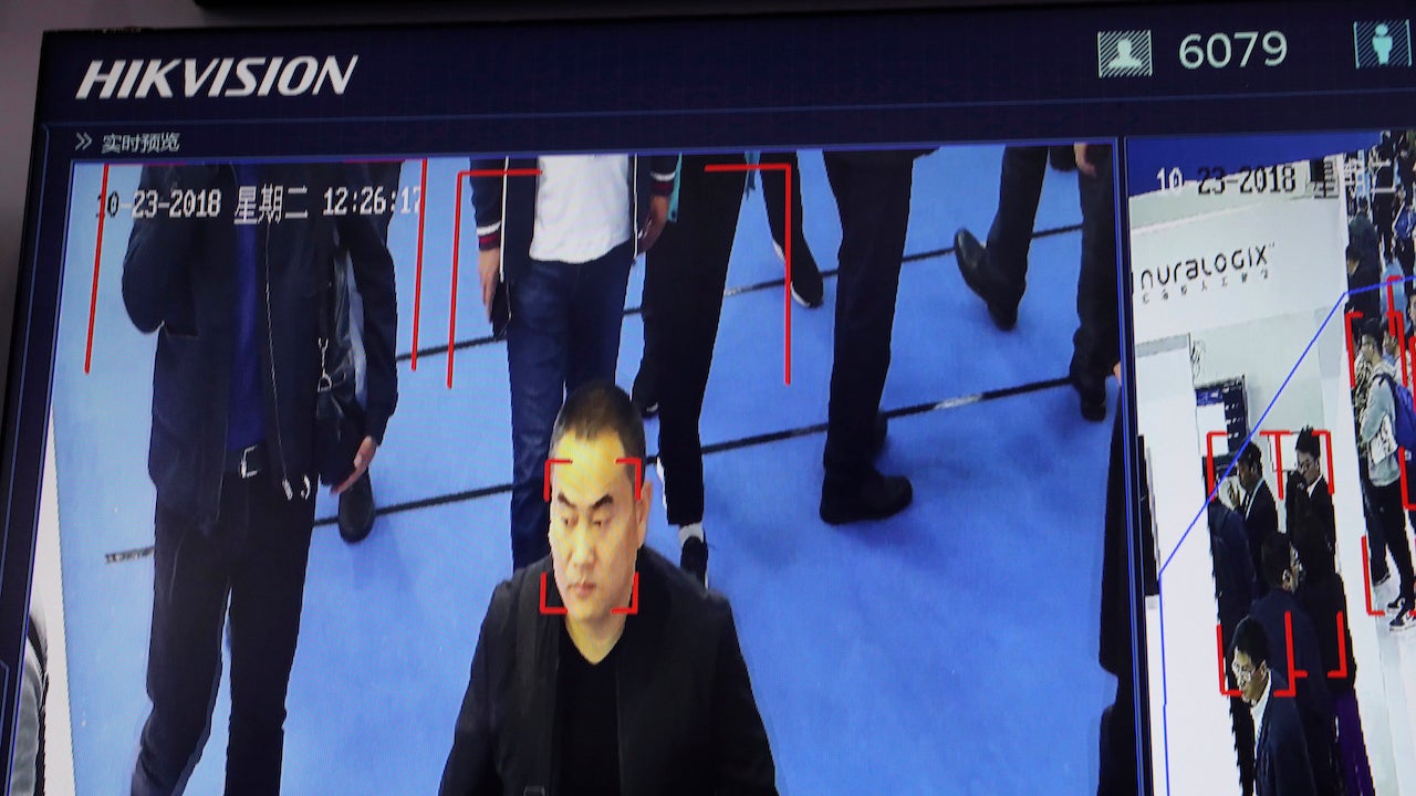 An unnamed man at a trade show has his face marked for identification by Hikvision on a monitor at Security China 2018 in Beijing, China on October 23, 2018