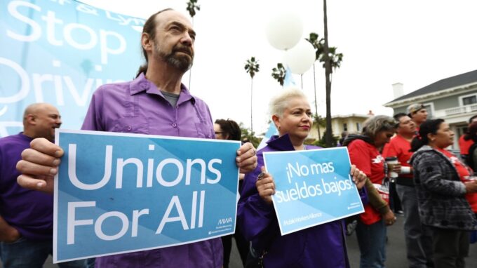 Uber and Lyft Drivers Strike Alongside Fast Food Workers in LA, Demand ...