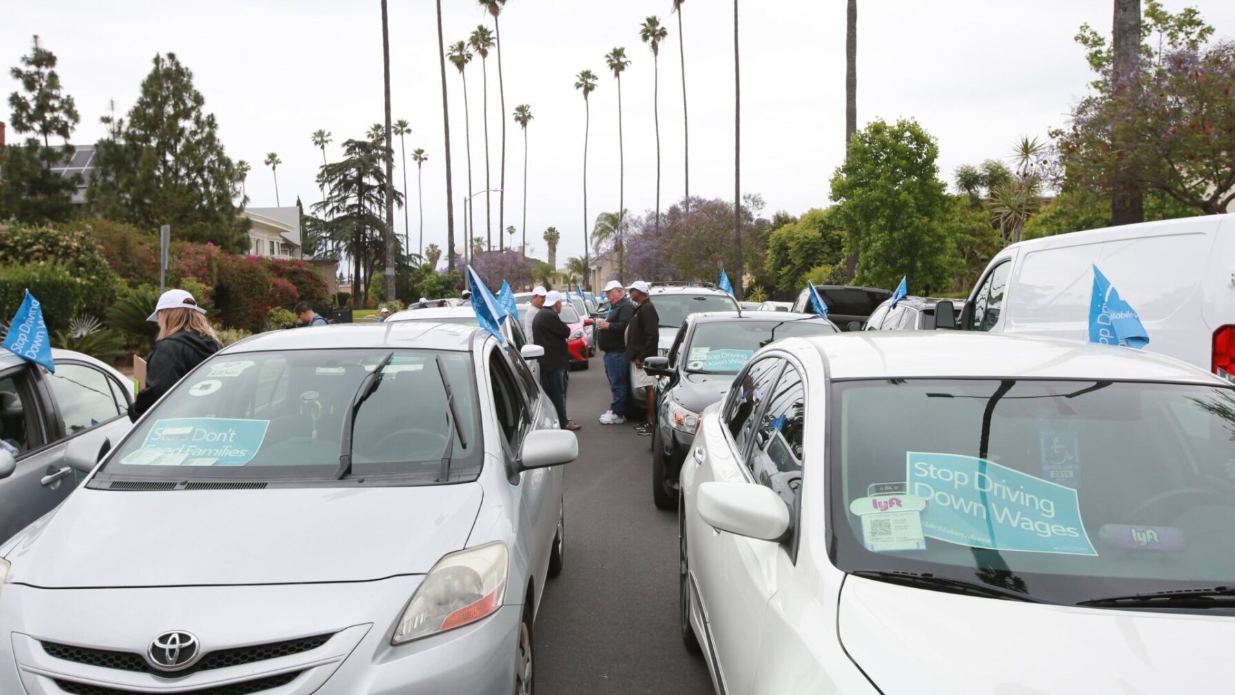 Uber and Lyft Drivers Strike Alongside Fast Food Workers in LA, Demand ...