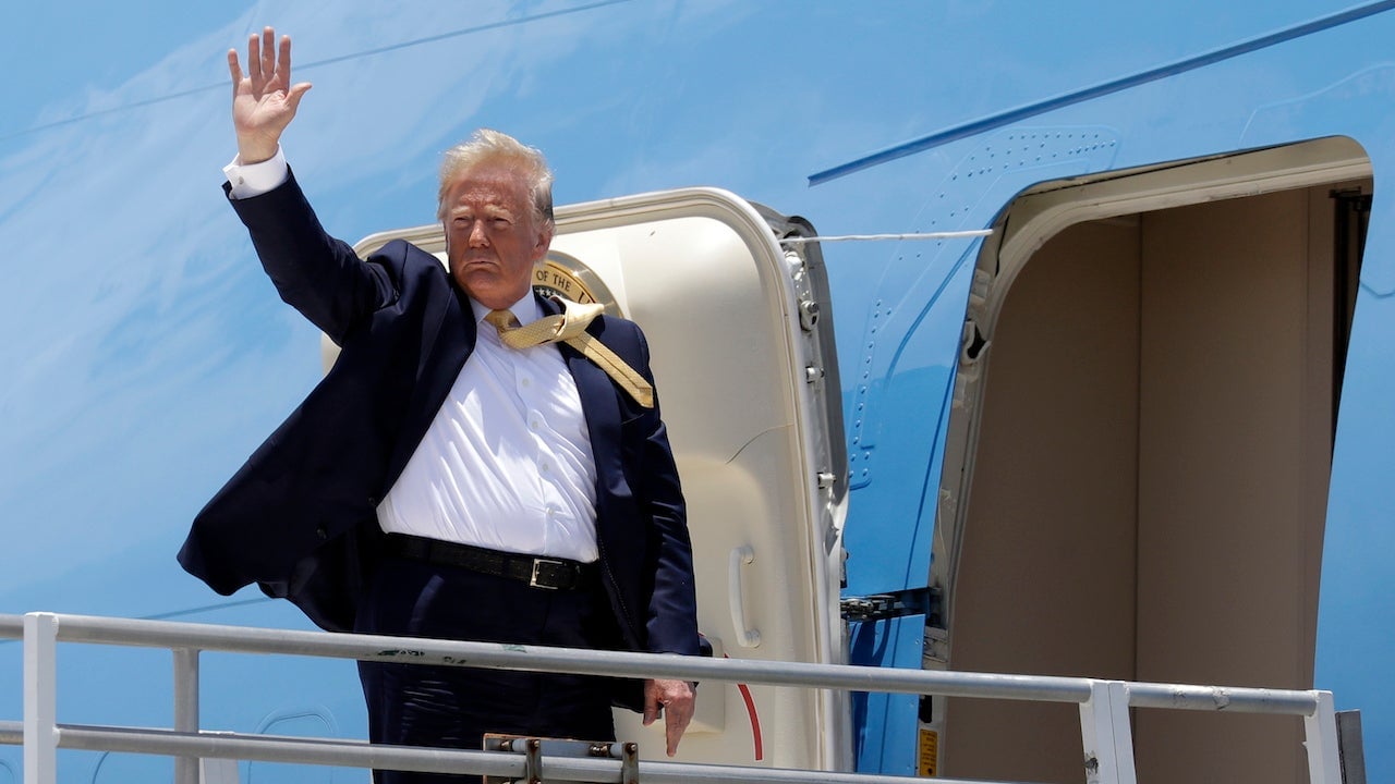President Donald Trump boards Air Force One at Miami International Airport, Wednesday, June 19, 2019, in Miami.