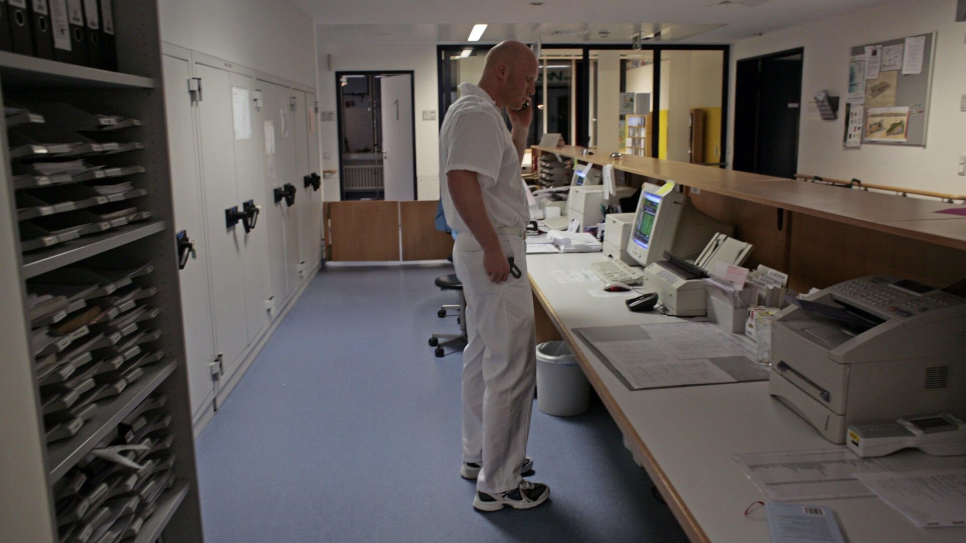 A specialist doctor for casualty surgery managing patients by phone at Martin Luther University in Halle, Germany, in 2006. Stock photo.