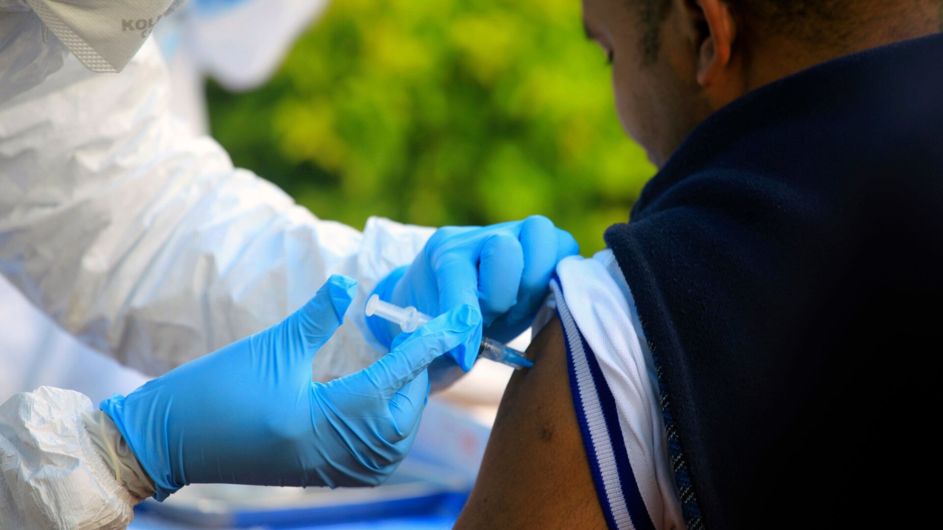 A man in the Democratic Republic of Congo getting a dose of the experimental Ebola vaccine.