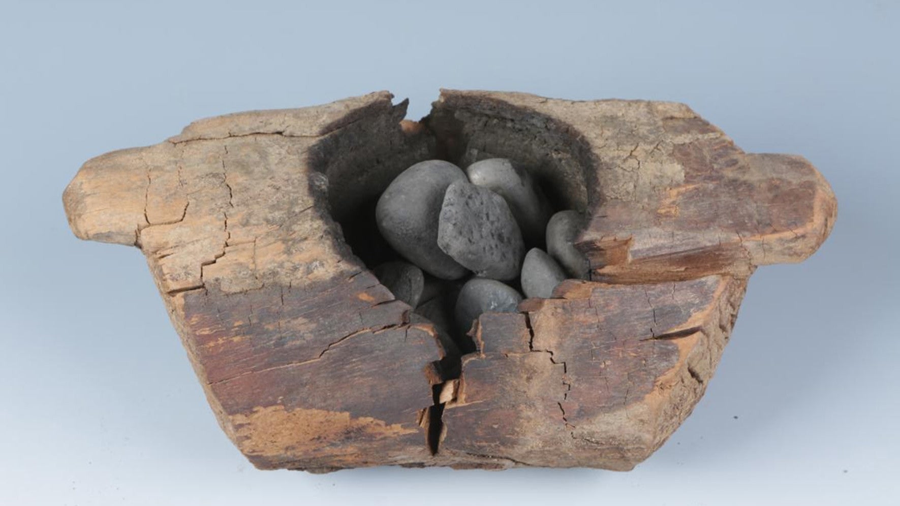 One of the wooden braziers dug up from the burial site in Central Asia.