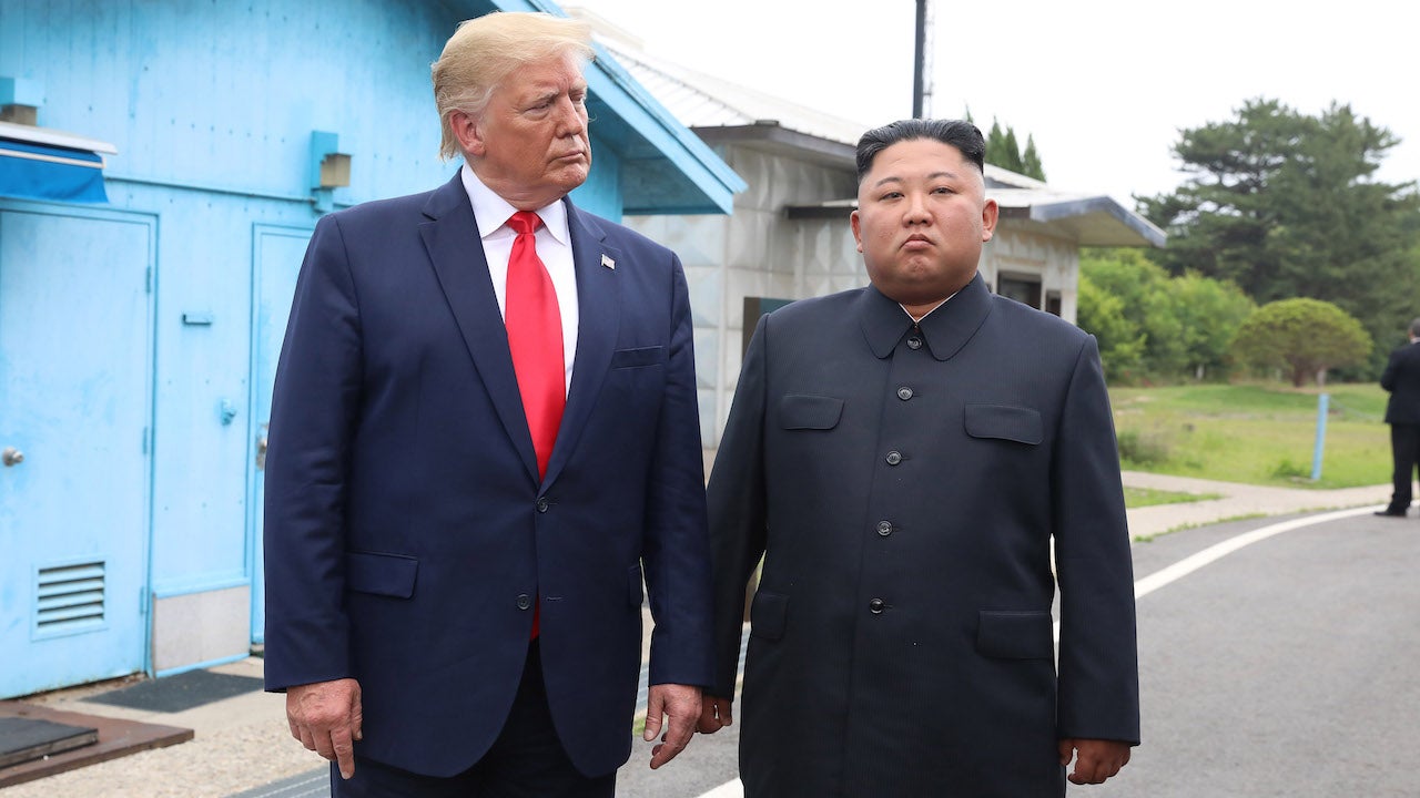 A handout photo provided by North Korean dictator Kim Jong Un and U.S. President Donald Trump inside the demilitarized zone (DMZ) separating the South and North Korea on June 30, 2019.