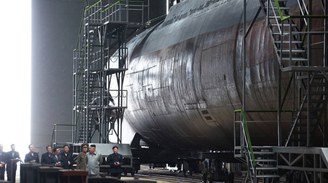 A photograph said to show North Korean leader Kim Jong Un during a tour of a newly built submarine from North Korea’s state-run KCNA network (and which has not been independently verified by Gizmodo).