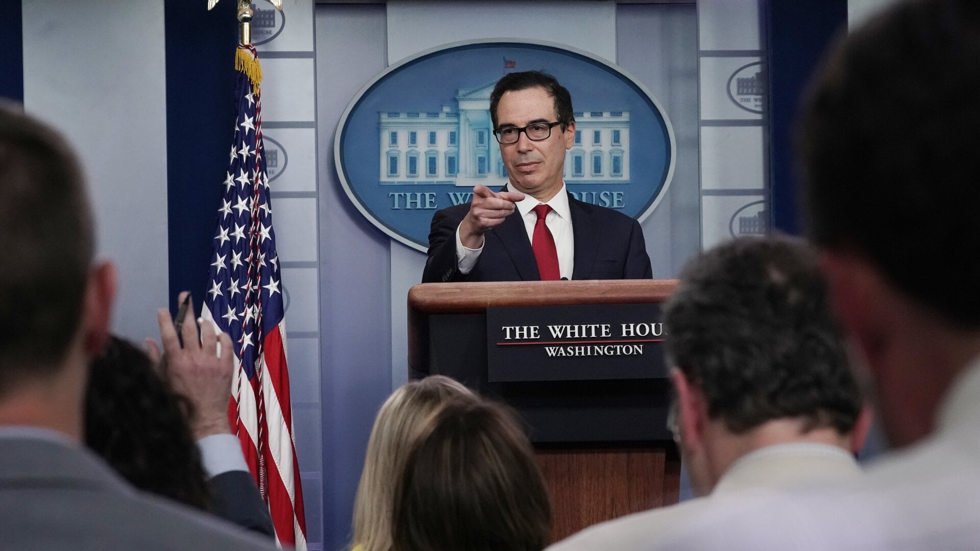 Treasury Secretary Steven Mnuchin talks to reporters about cryptocurrency at the White House July 15, 2019 in Washington, DC.