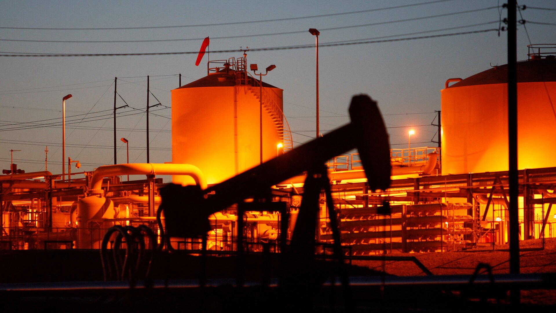 Pump jacks and wells are seen in an oil field on the Monterey Shale formation where gas and oil extraction using hydraulic fracturing, or fracking, is on the verge of a boom on March 23, 2014 near McKittrick, California.