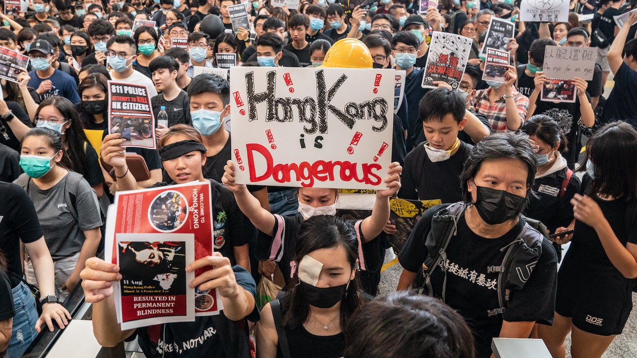Protesters occupy the arrival hall of the Hong Kong International Airport during a demonstration on August 12, 2019 in Hong Kong, China