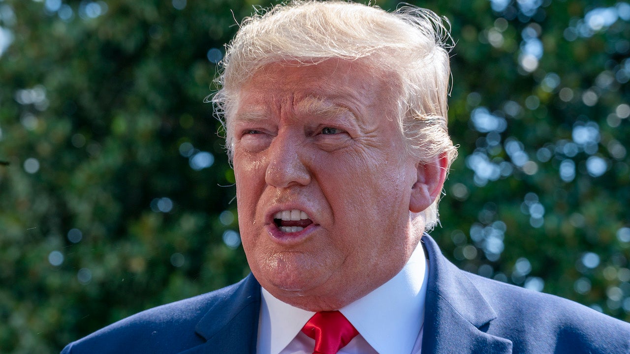 White supremacist Santa Claus, Donald Trump, at the White House on August 9, 2019