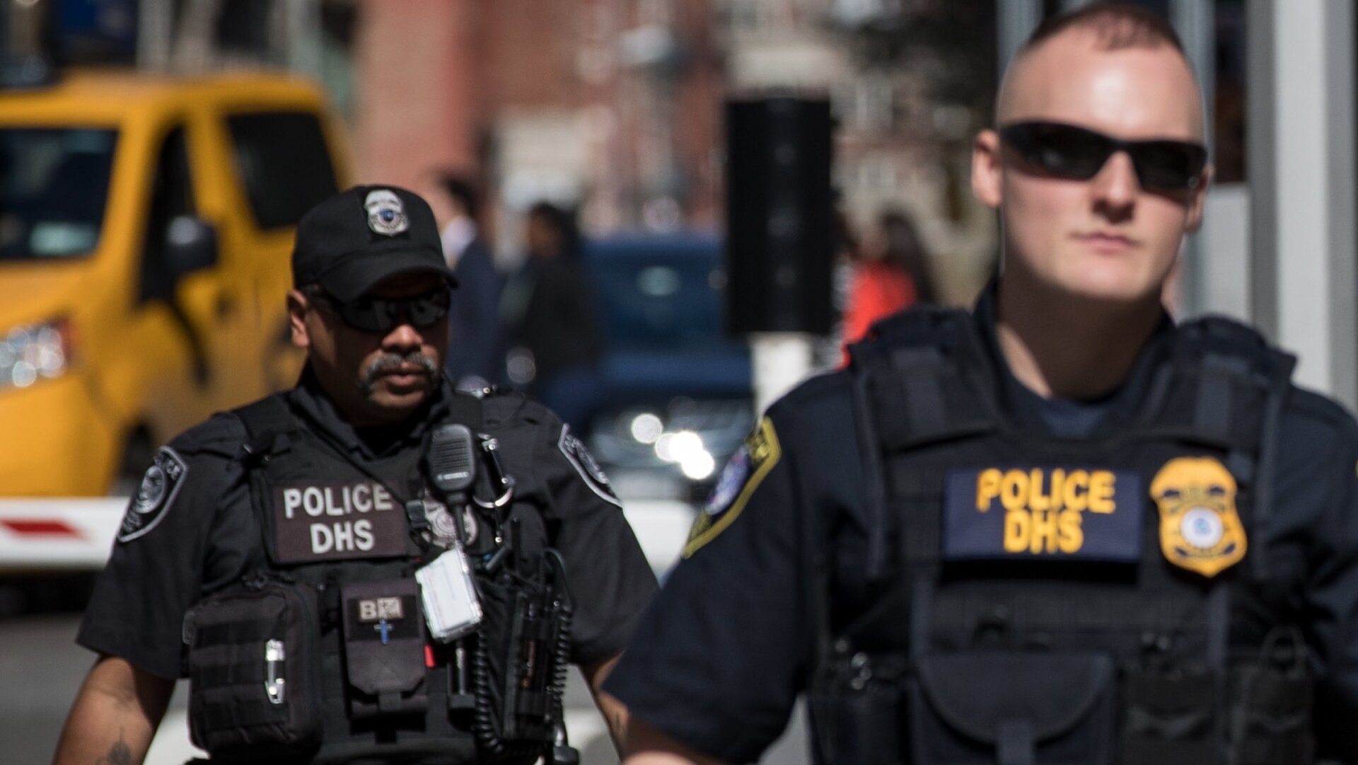 DHS police accompanying Amalija Knavs, the mother of first lady Melania Trump, as she arrived at the U.S. Citizenship and Immigration Services building in New York in May 2018.