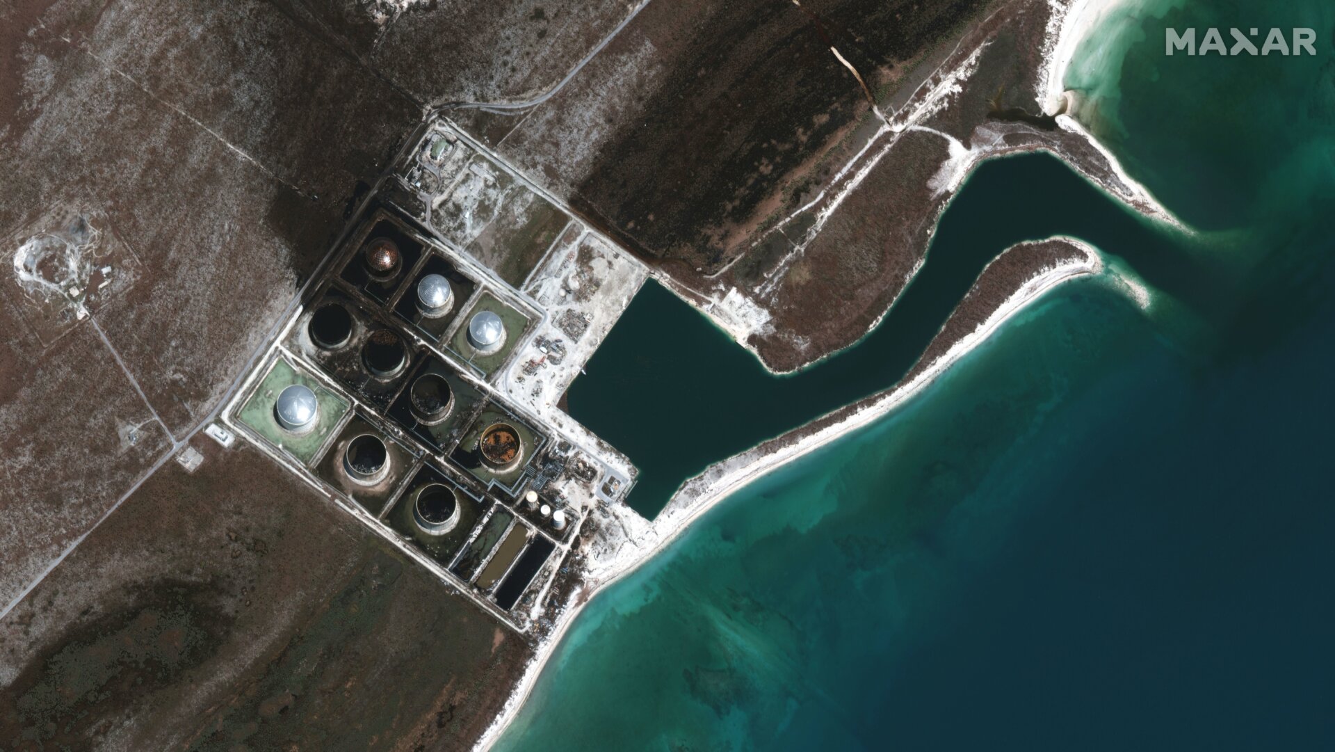 The South Riding Point facility in Grand Bahama Island on September 9, 2019. You can still see the black oil spilled out and across the land nearby.