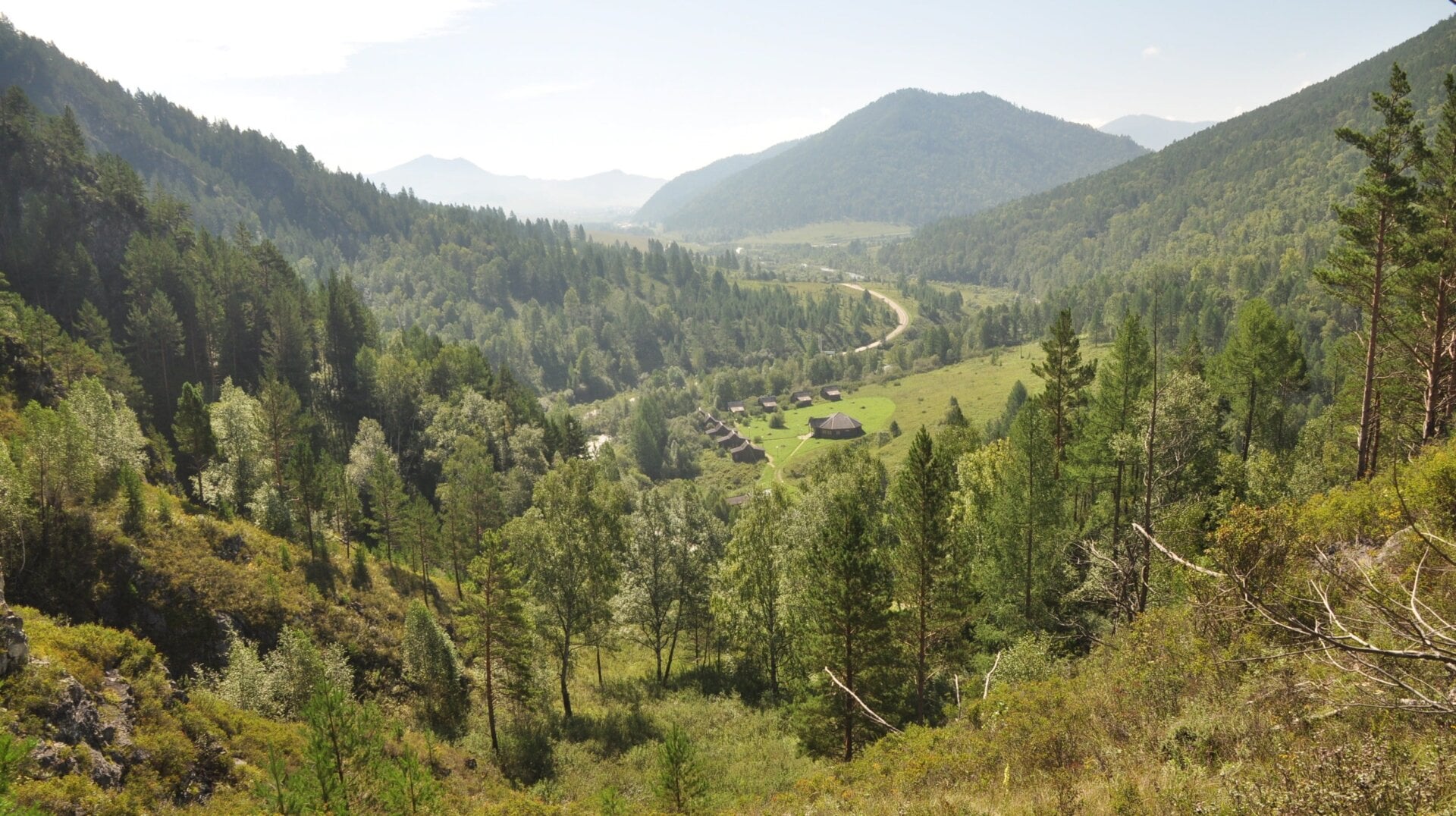 The landscape around the entrance of Denisova Cave in Siberia.