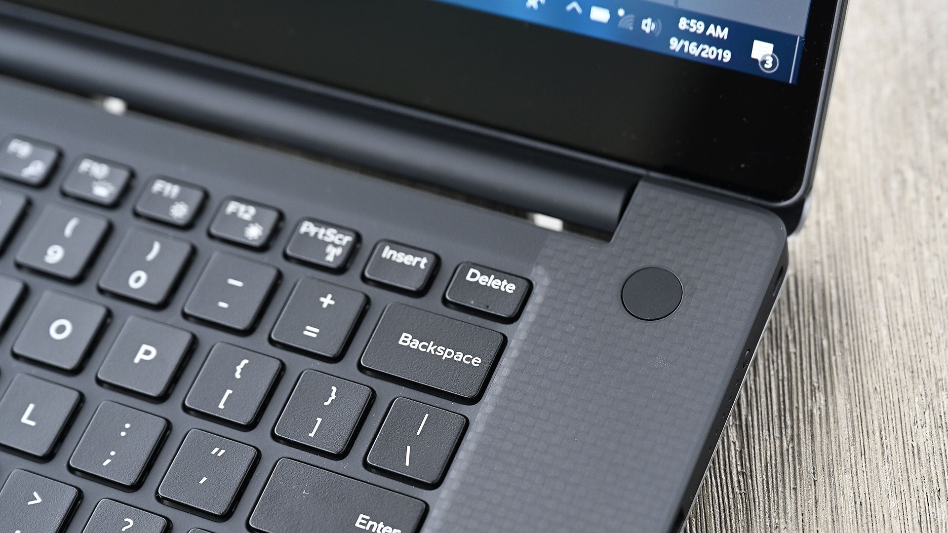 The Dell XPS 15's power button now pulls double duty as a Windows 10 fingerprint reader.