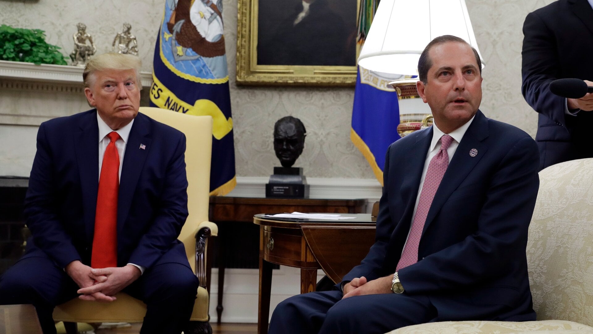 President Donald Trump and Health and Human Services Secretary Alex Azar talk to the media in the Oval Office, Wednesday, Sept. 11, 2019, at the White House in Washington.