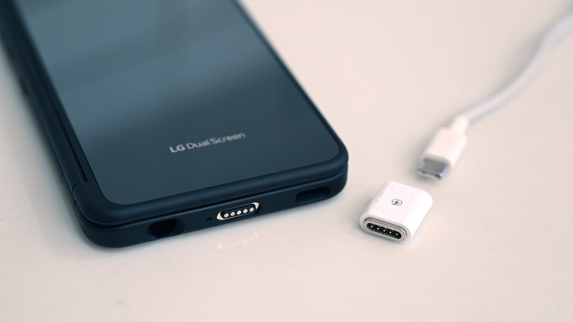 Because there isn’t room for a normal USB-C port on the Dual Screen accessory, to charge using a wire, you need to use LG’s custom magnetic charging adapter (which comes included), or take the phone out of the case.