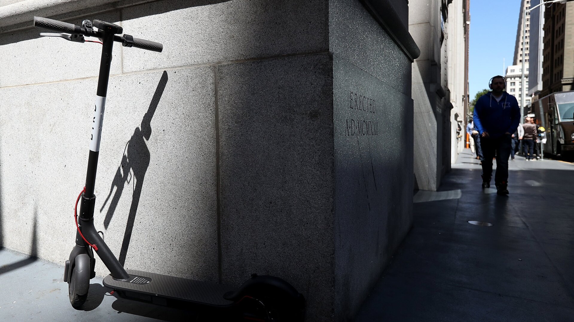 A Bird scooter sits parked on a street corner on April 17, 2018, in San Francisco, California. Three weeks after three companies started placing electric scooters on the streets for rental, San Francisco City Attorney Dennis Herrera issued cease-and-desist notice to electric scooter rental companies Bird, LimeBike and Spin.