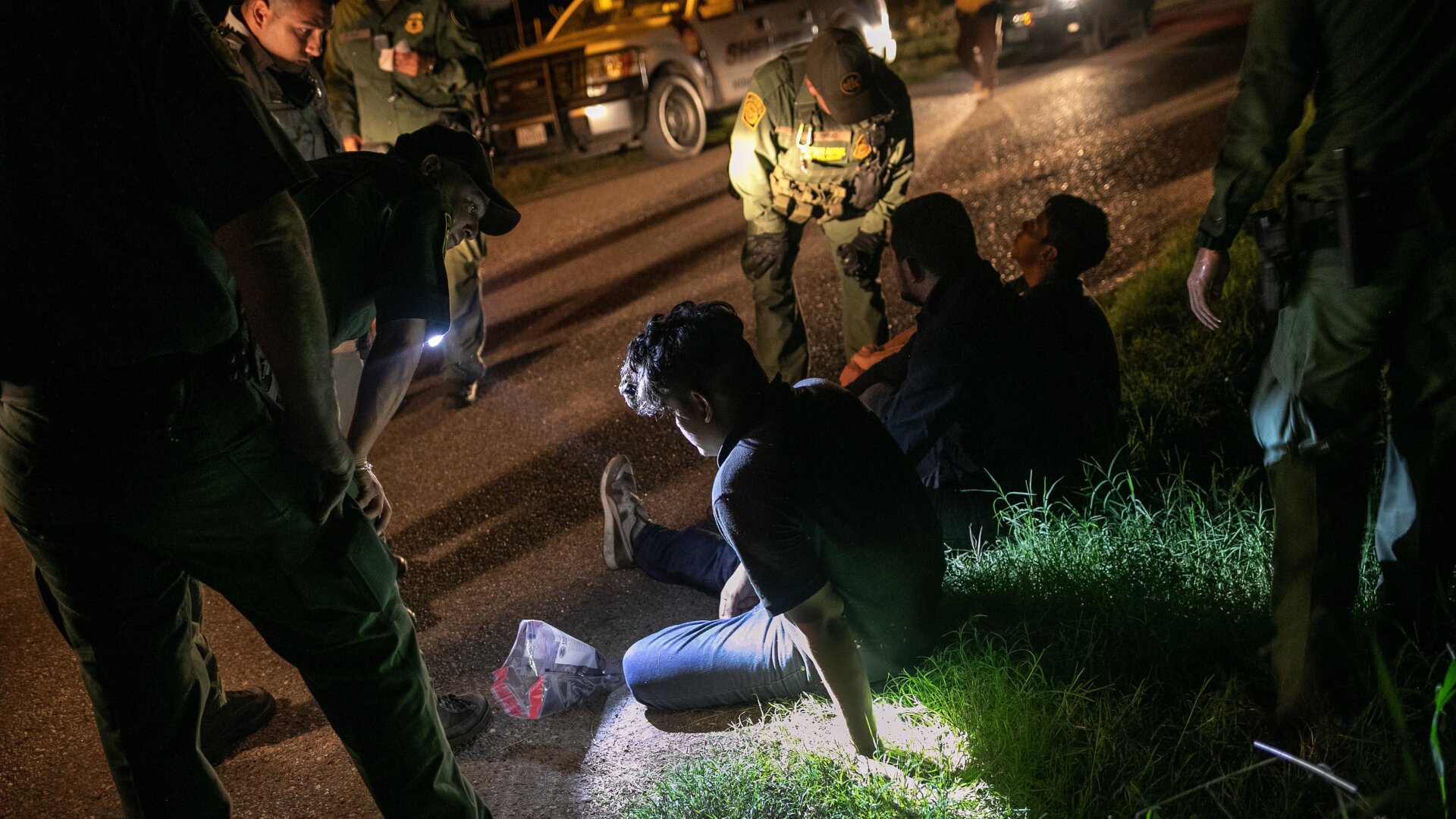 U.S. Border Patrol agents detain immigrants in Mission, Texas