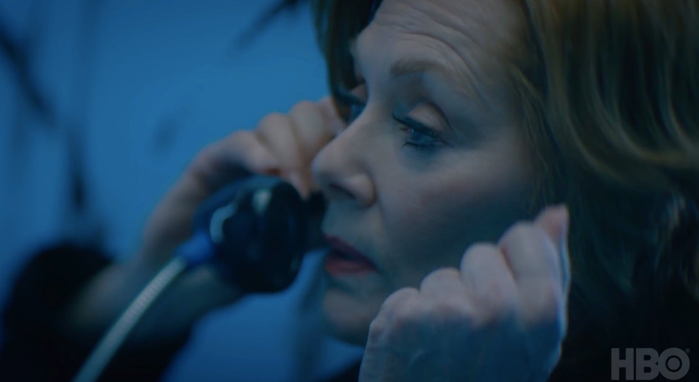 Agent Laurie Blake making a phone call to an old friend.