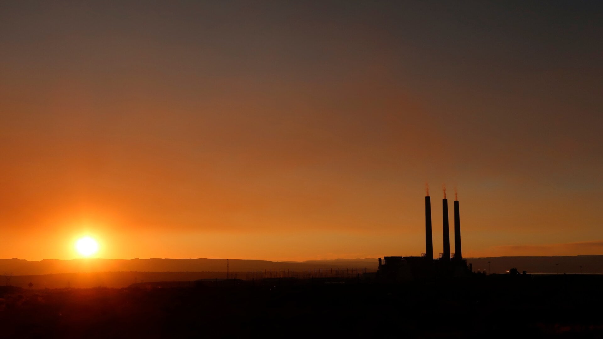The sun sets on the Navajo Generating Station.