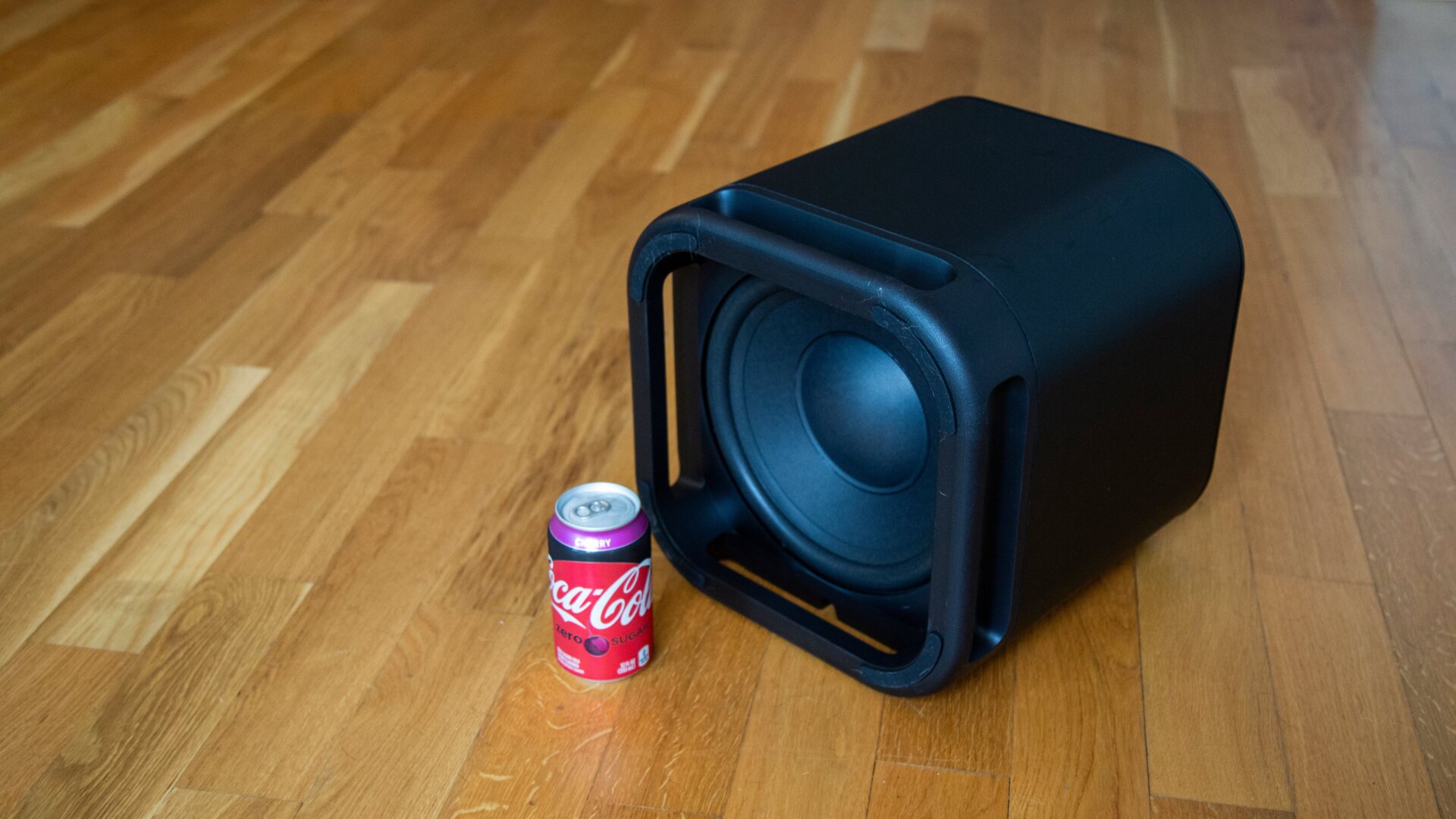 To give you an idea of the size of the Roku Subwoofer, I flipped it on its side to expose the woofer and put a Cherry Coke next to it.