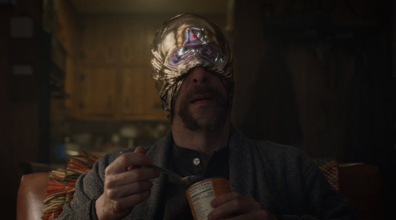 Looking Glass watching American Hero Story.