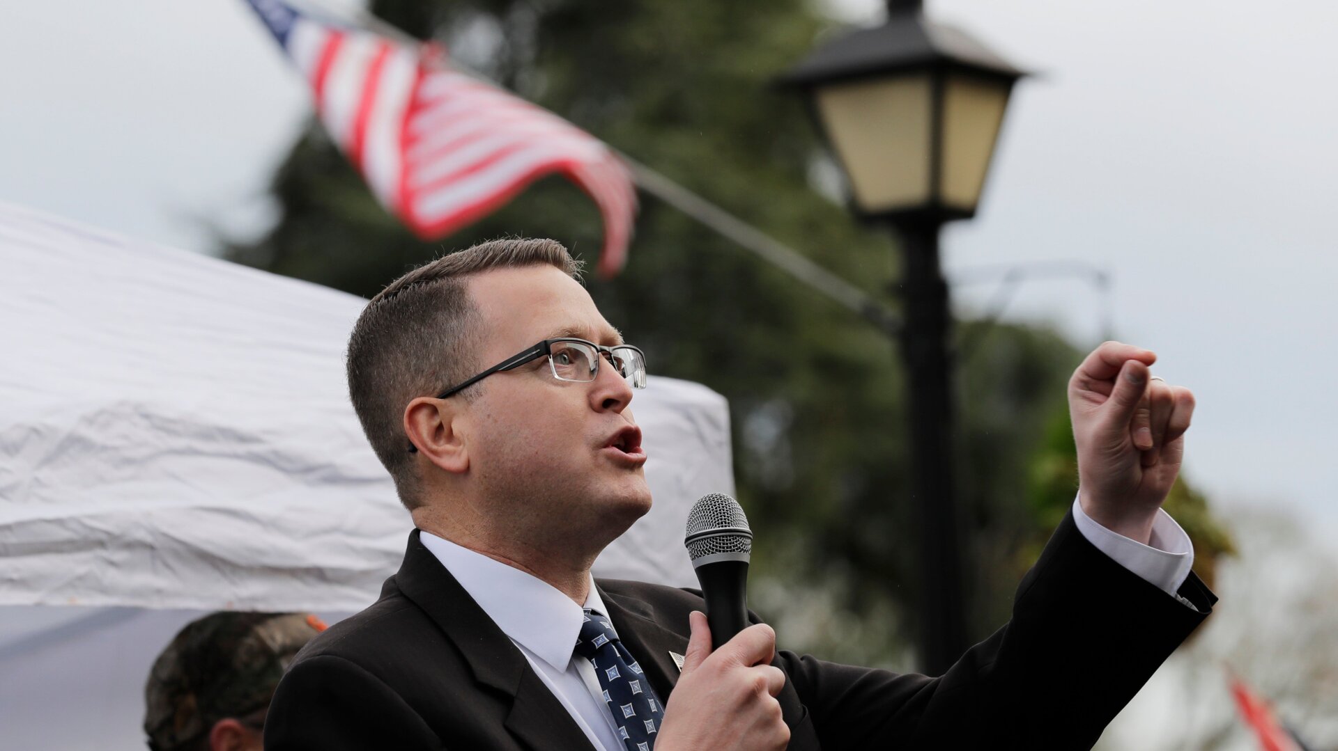 Rep. Matt Shea, R-Spokane Valley, speaks at a gun-rights rally, Friday, Jan. 18, 2019, at the Capitol in Olympia, Wash.