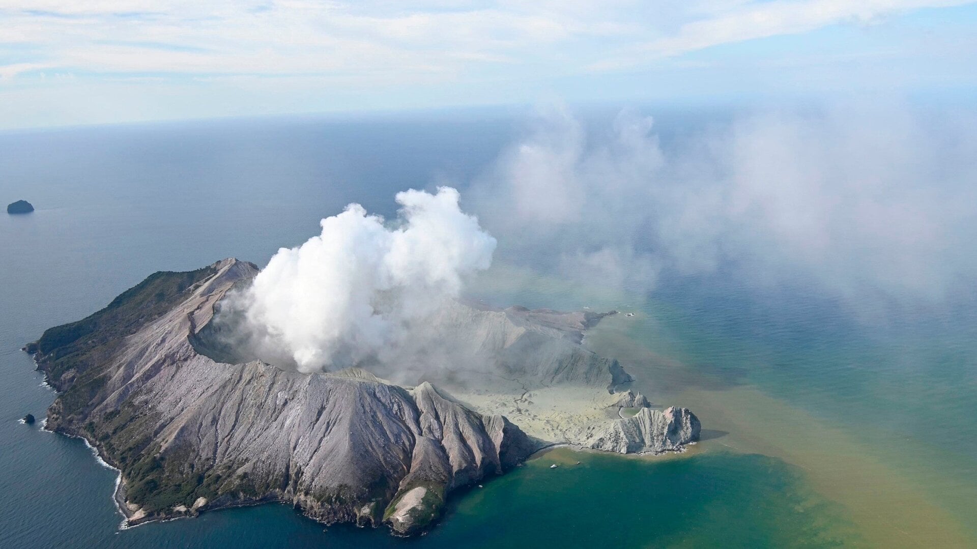 The White Island Volcano plume rises into the sky Monday, December 9, 2019.