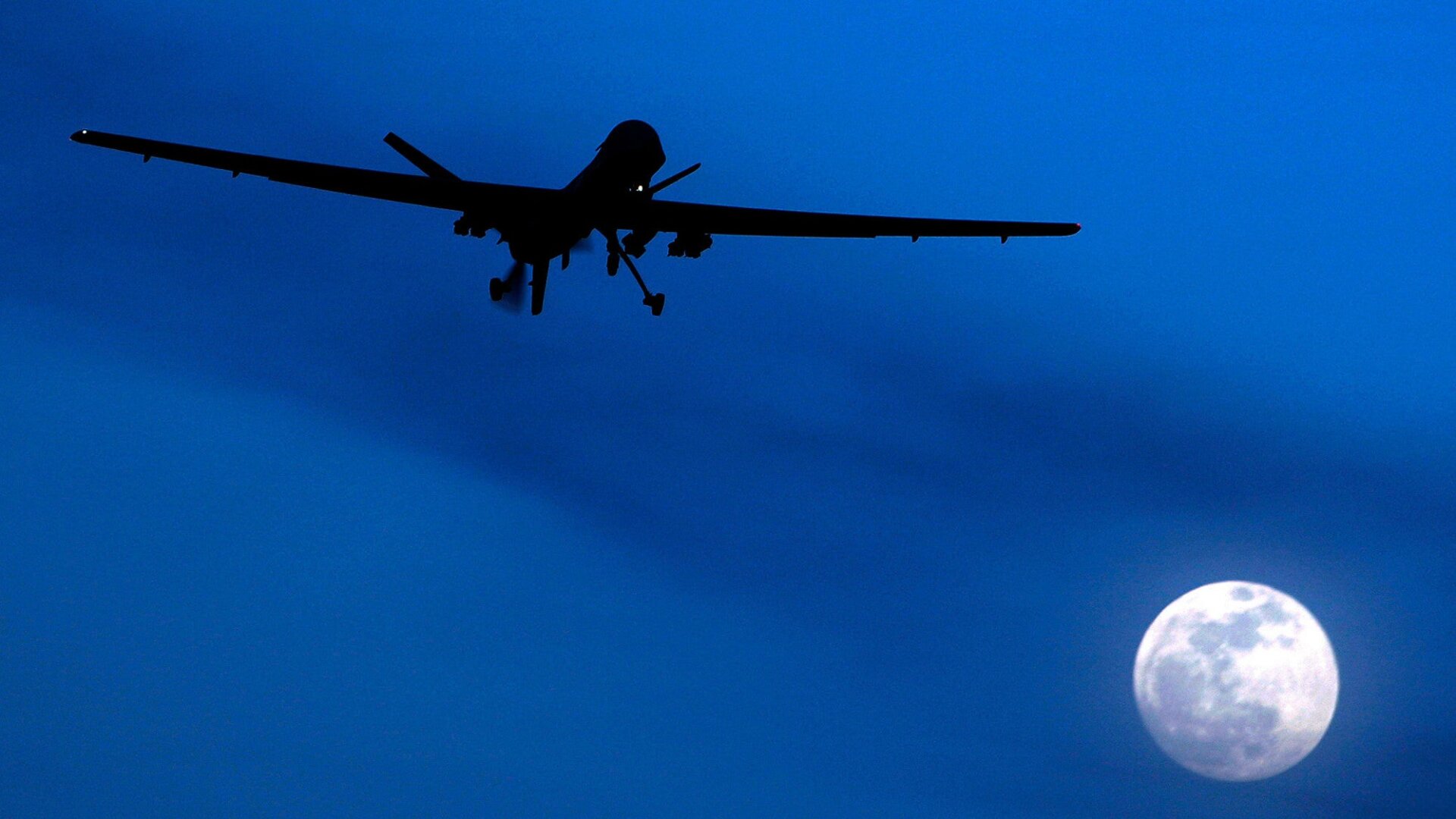 A fixed-wing U.S. Predator drone flying in Kandahar Air Field in Afghanistan in 2010.