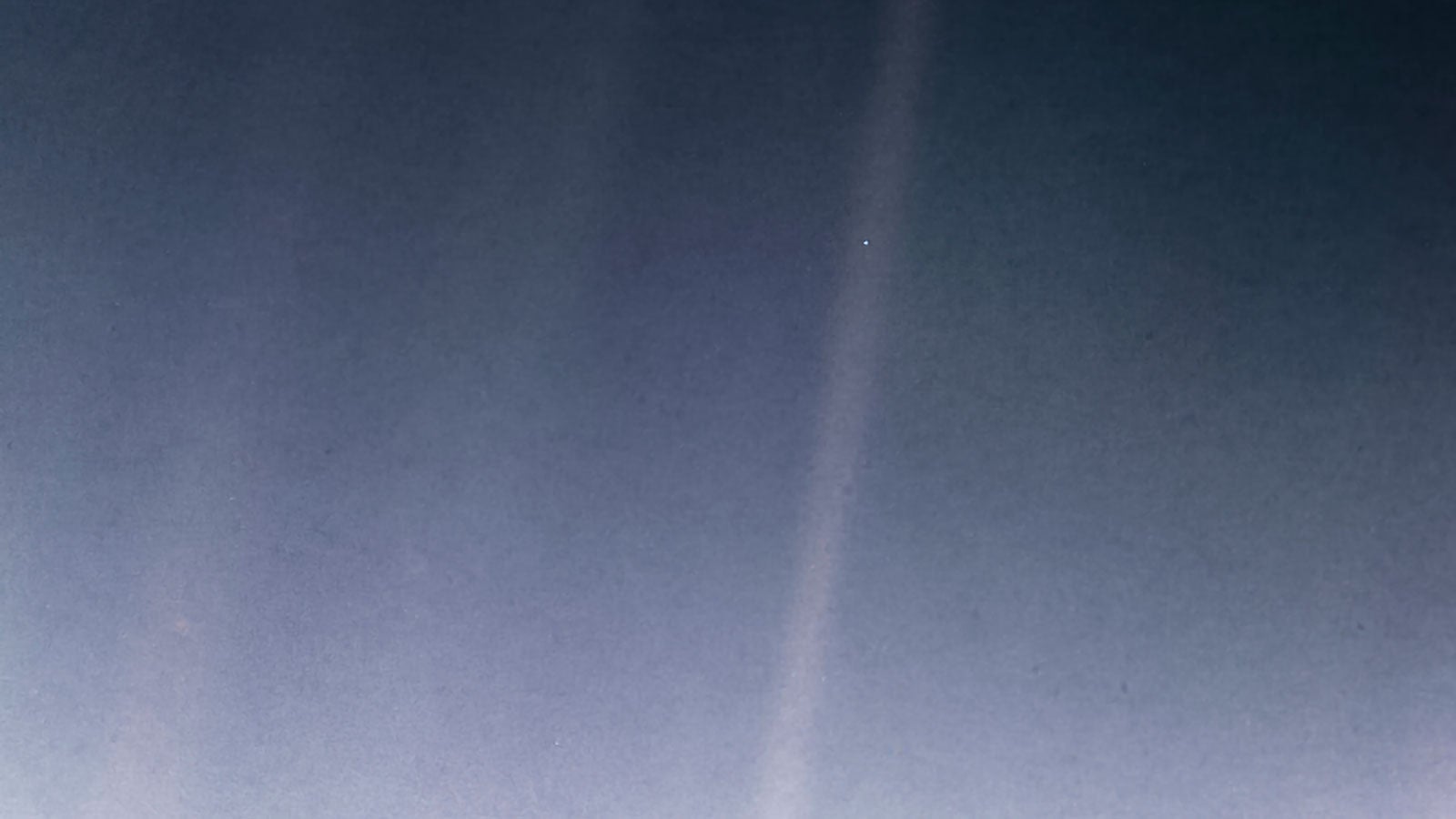 The re-processed Pale Blue Dot photograph taken by Voyager 1 on February 14, 1990.