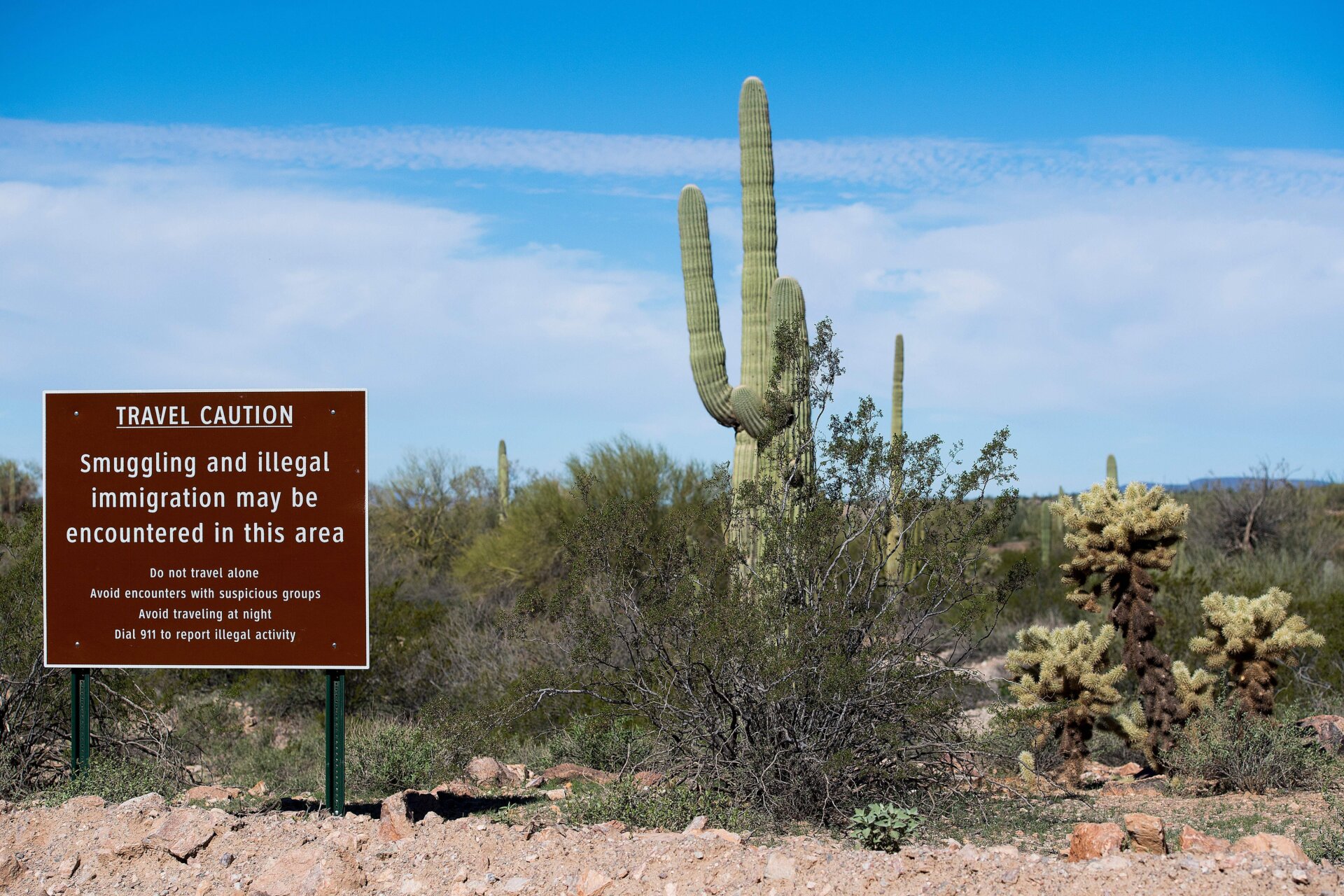 A sign warns against illegal smuggling in Organ Pipe Cactus National Monument near Lukeville, Arizona.