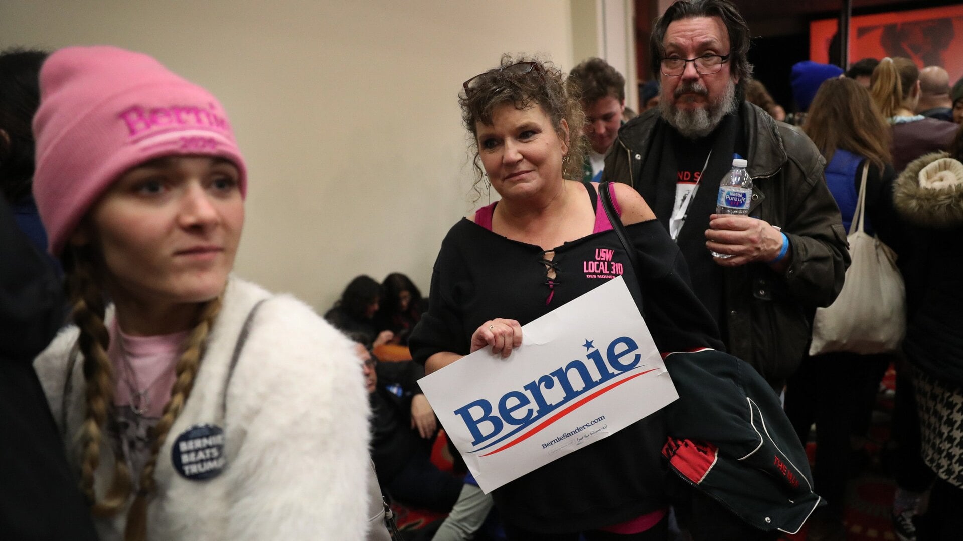 People leave the caucus night party of Democratic presidential candidate Sen. Bernie Sanders (I-VT) after the results of the caucus were delayed on February 03, 2020 in Des Moines, Iowa.