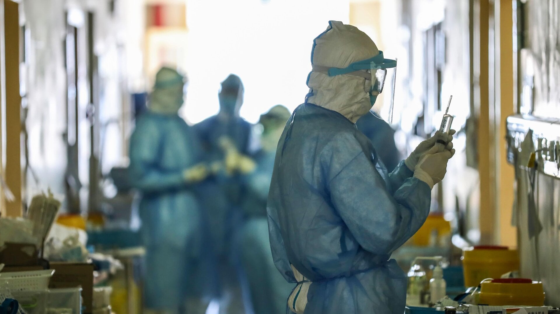 This photo taken on February 16, 2020 shows medical staff members working at the isolation ward of the Wuhan Red Cross Hospital in Wuhan in China’s central Hubei province.