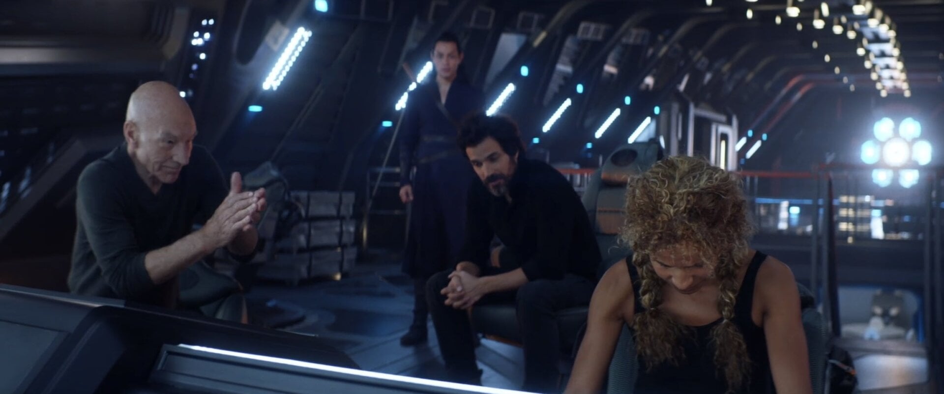 Picard applauds an all-too-real performance from Raffi.