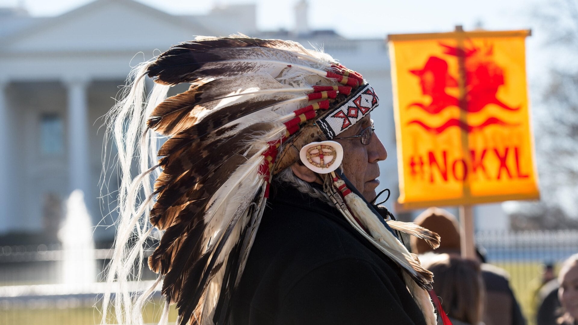 Lakota spiritual leader Chief Arvol Looking Horse attends a demonstration against the proposed Keystone XL Pipeline outside the White House on January 28, 2015.