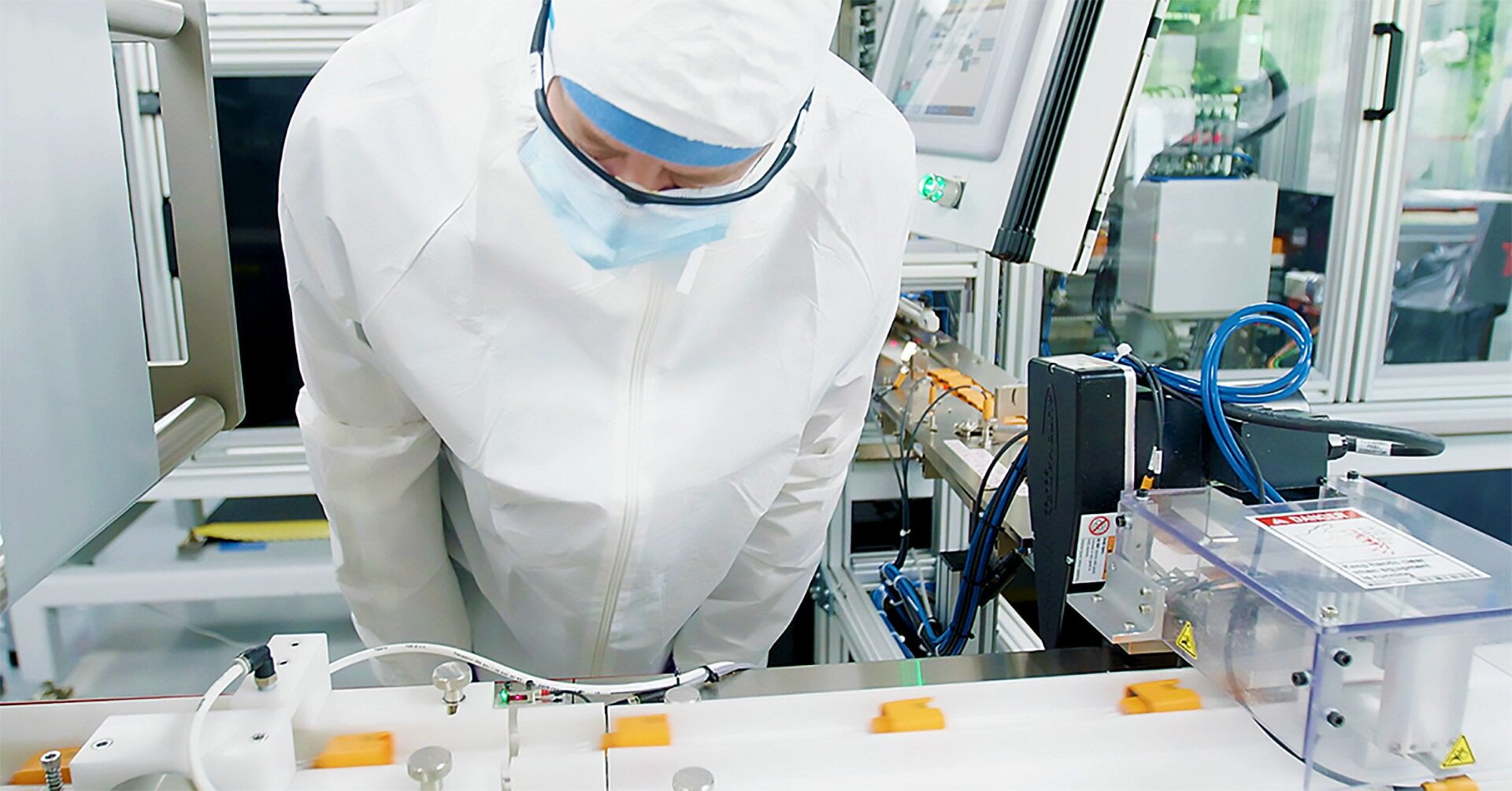 In the photo, Abbott’s ID NOW test components are made in a U.S. manufacturing facility. ID NOW is the company’s new five-minute coronavirus test.