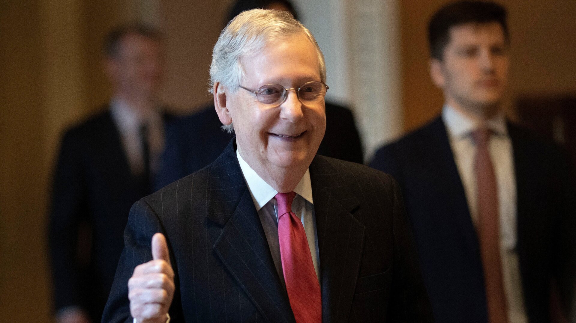 U.S. Senate Majority Leader Mitch McConnell (R-KY) gives a thumbs up sign after speaking on the floor of the U.S. Senate on March 25, 2020 in Washington, DC. (Photo by Win McNamee/Getty Images)