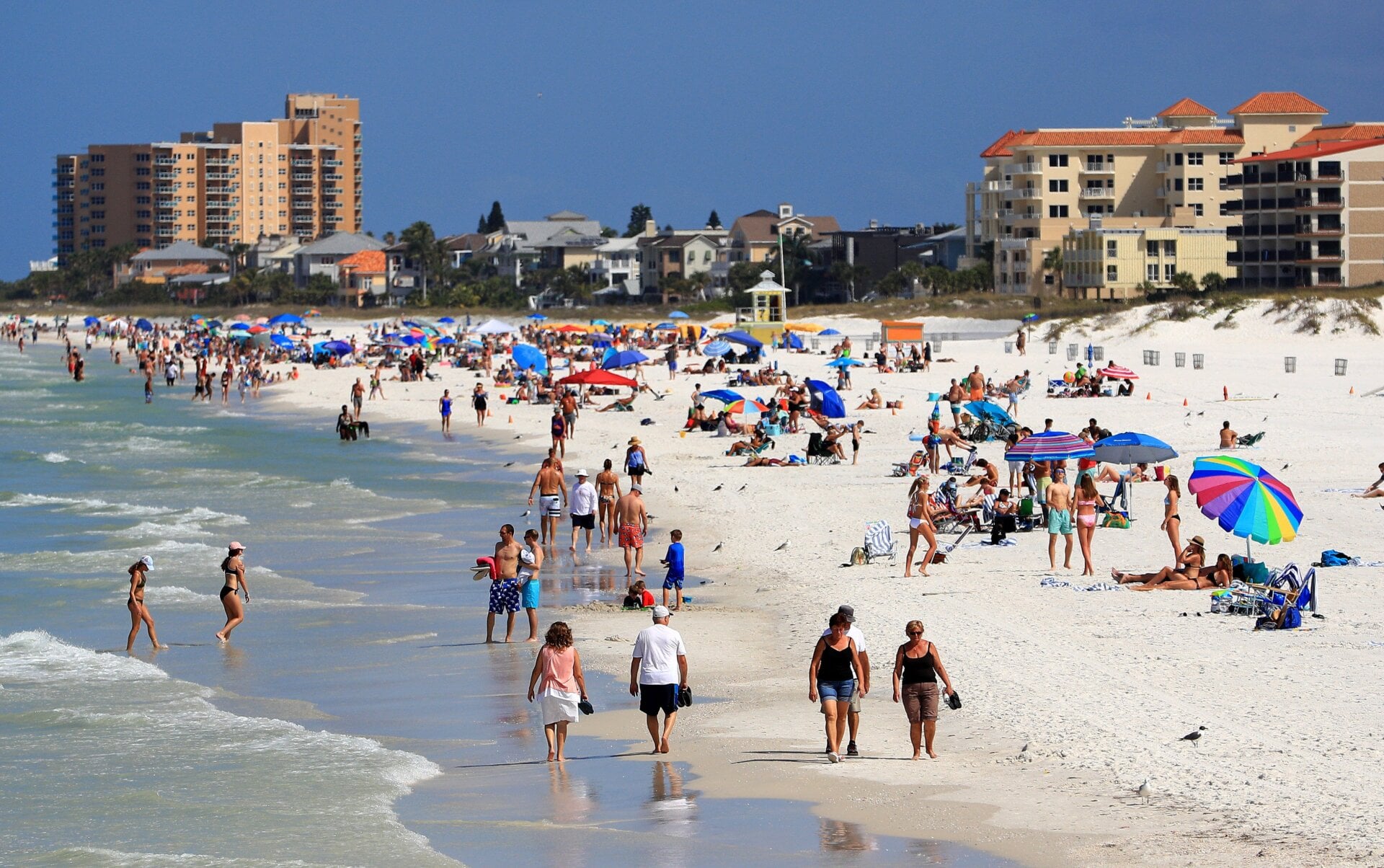 People visit Clearwater Beach during the coronavirus (COVID-19) pandemic March 20, 2020 in Clearwater, Florida. 