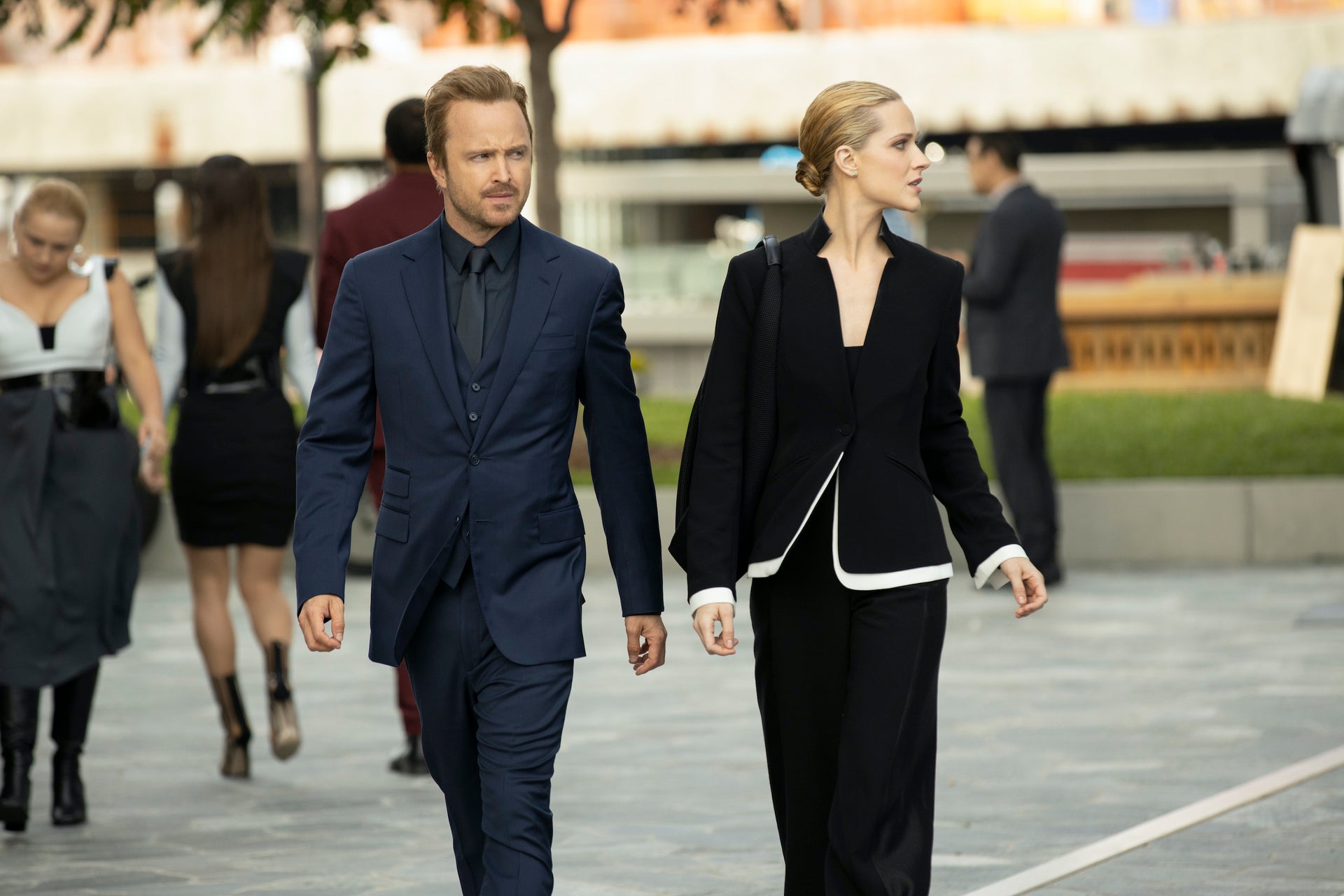 Caleb (Aaron Paul) has a couple things under control but damn, does he look sharp!